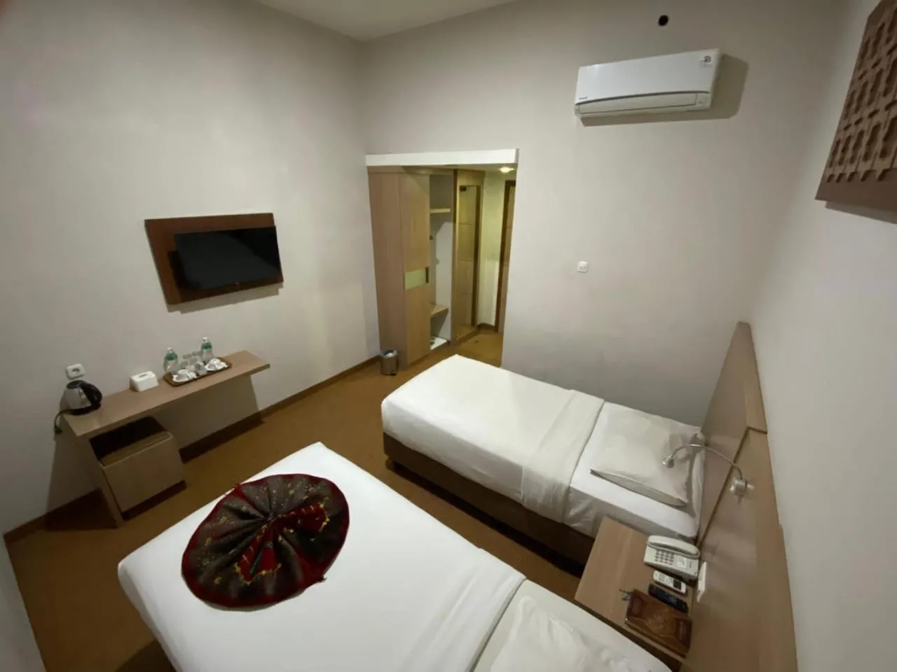 Bed in Grand Bunda Hotel Syariah Bukittinggi Powered By Archipelago