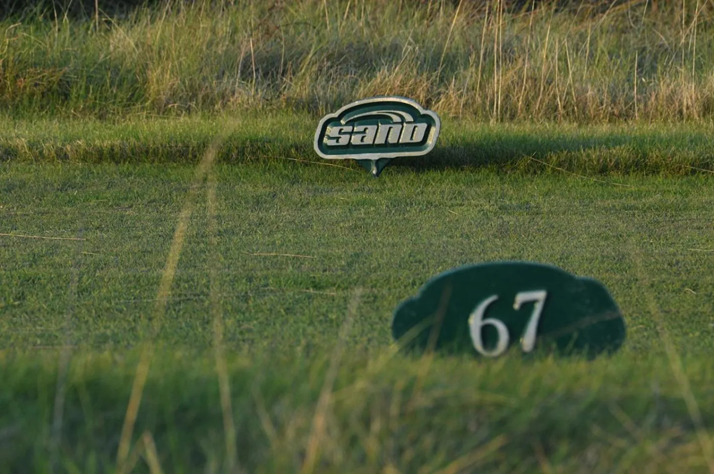Property logo or sign in Sand Golf Club