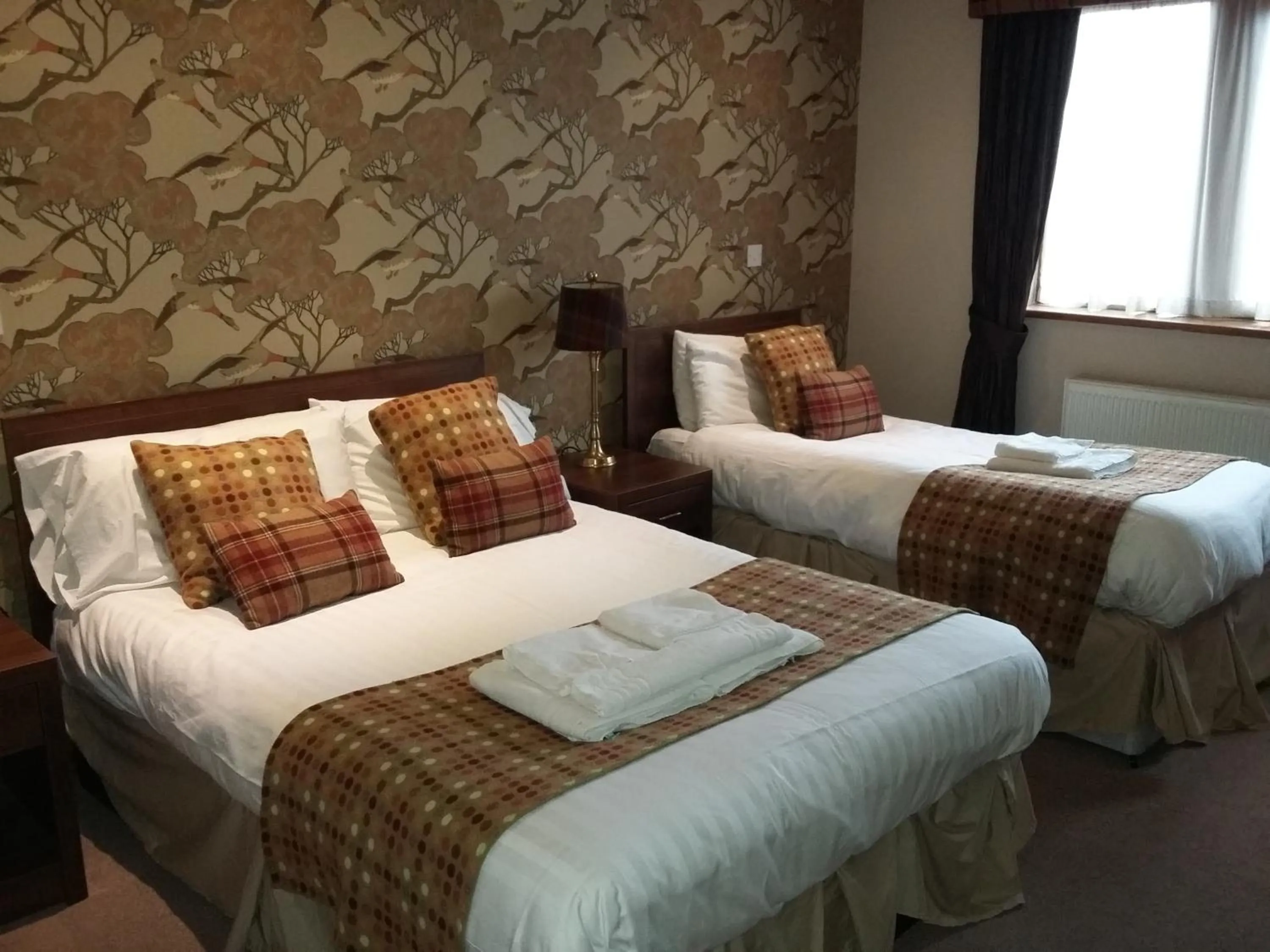 Bed in The Huntsman Inn