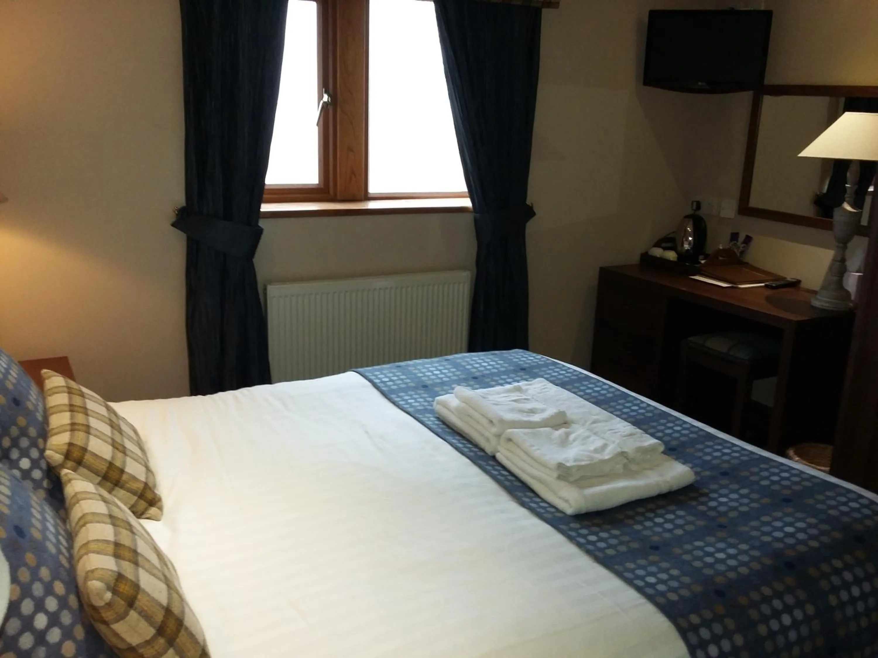 Bed in The Huntsman Inn