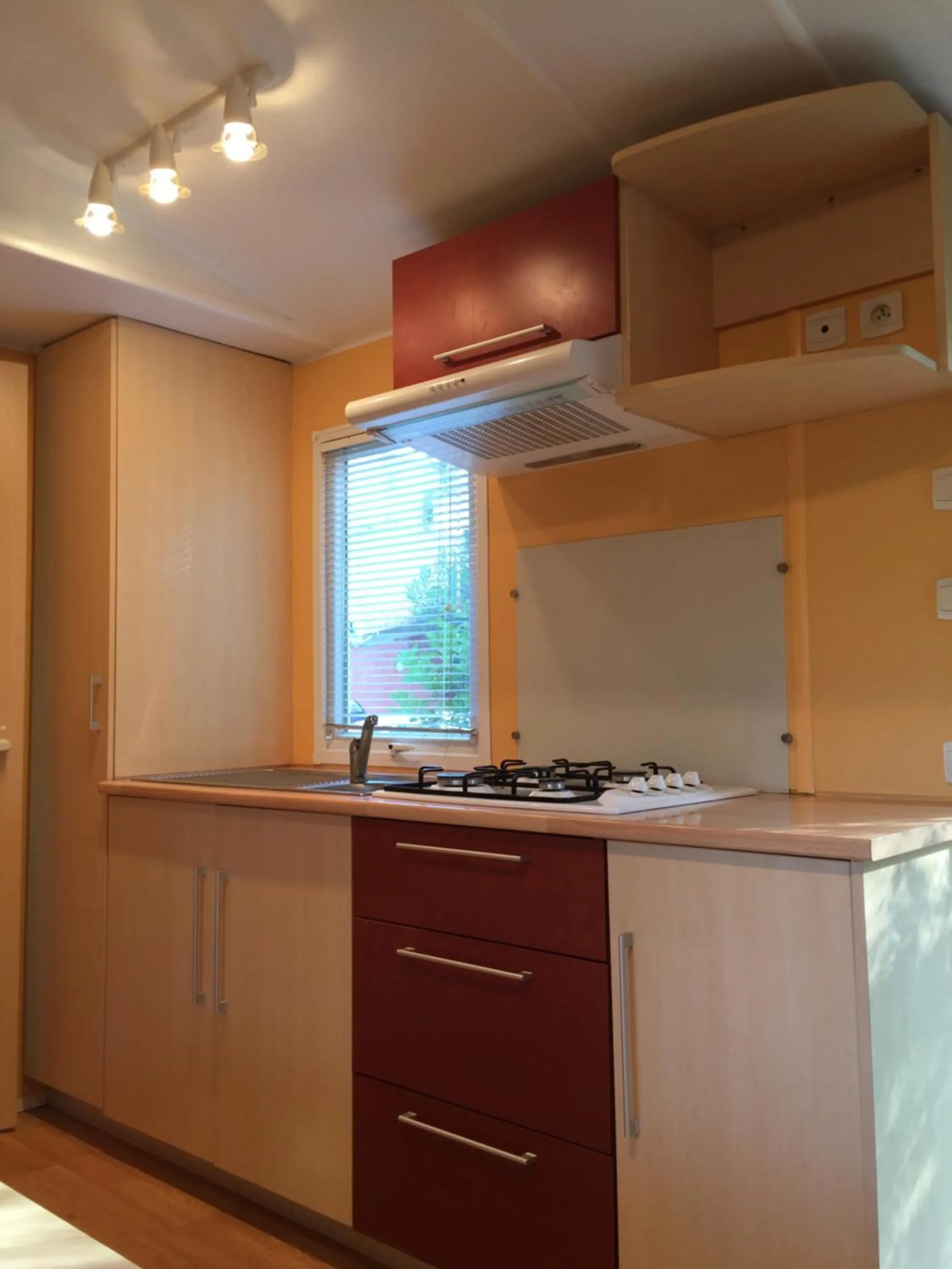 Kitchen or kitchenette in Camping les Orangers