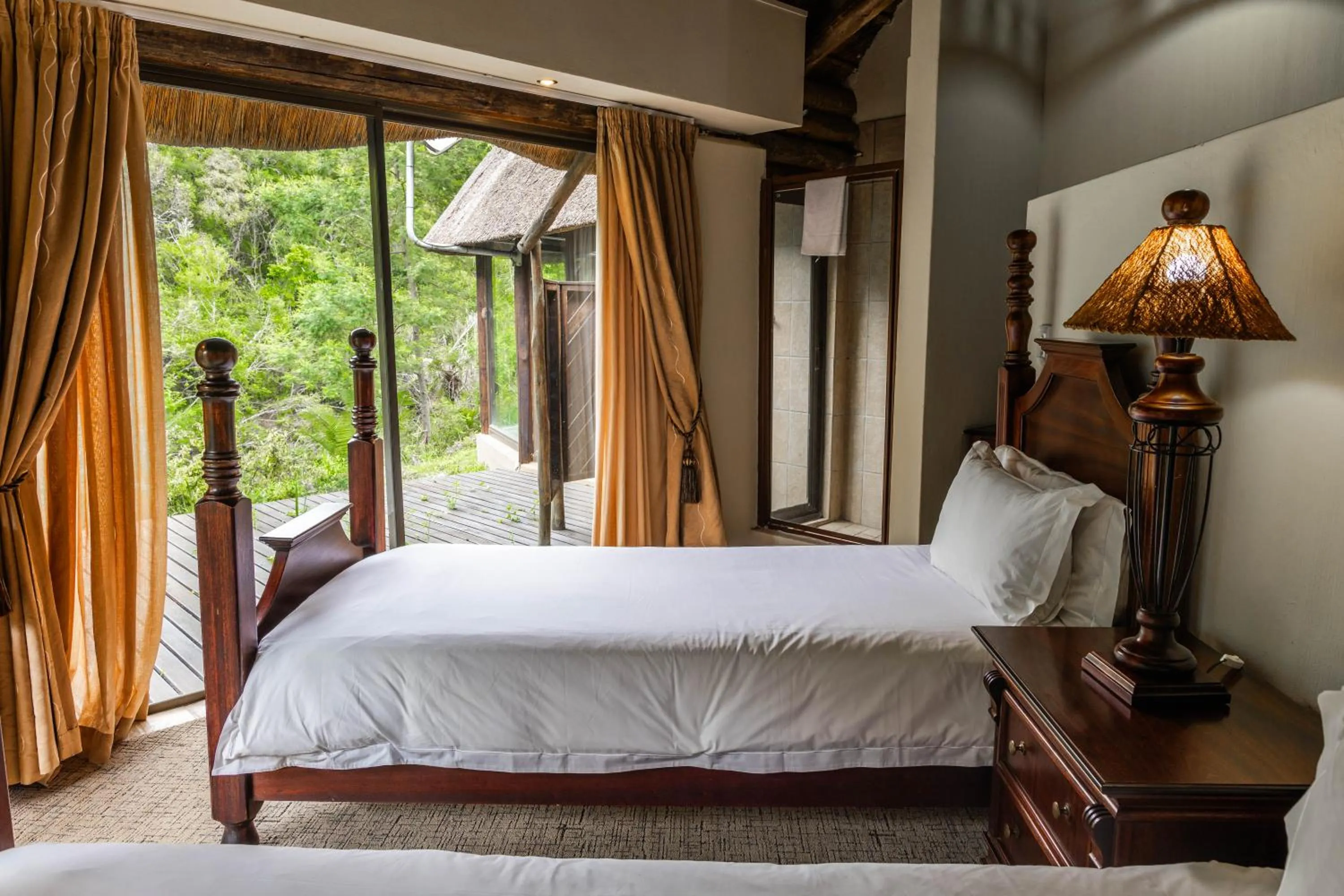 Bed in Premier Resort Mpongo Private Game Reserve