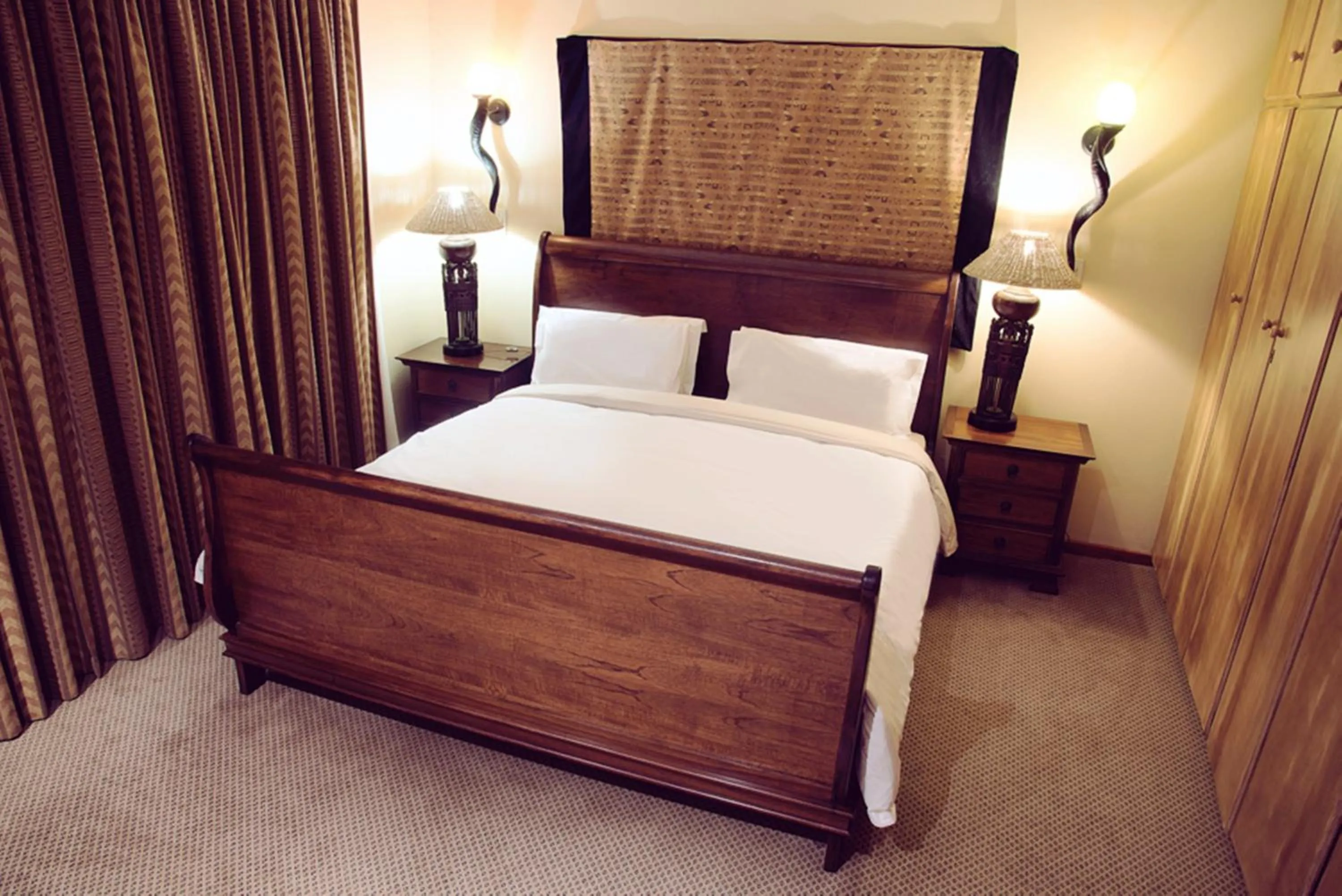 Bed in Premier Resort Mpongo Private Game Reserve