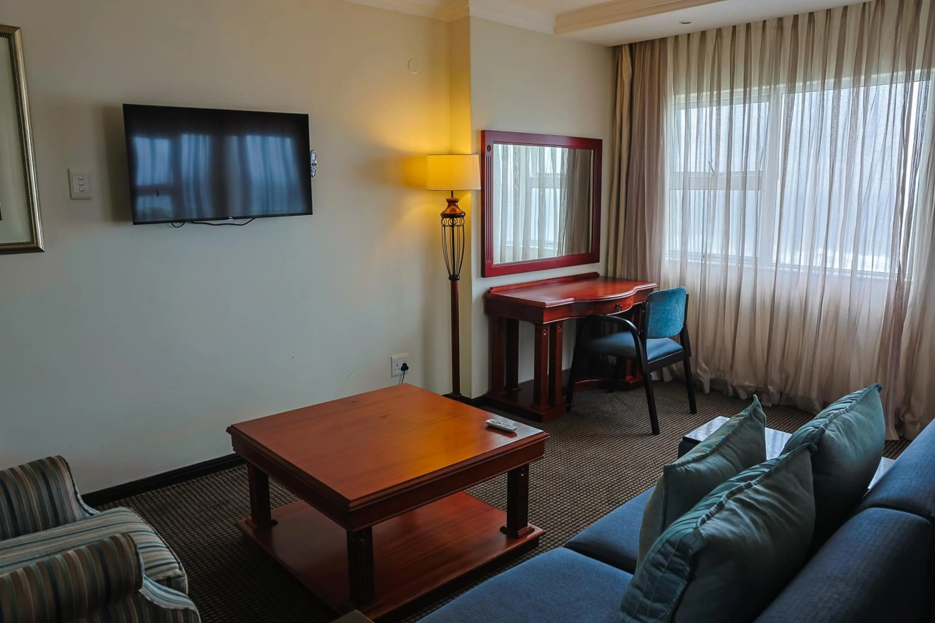 Living room in Premier Hotel Regent