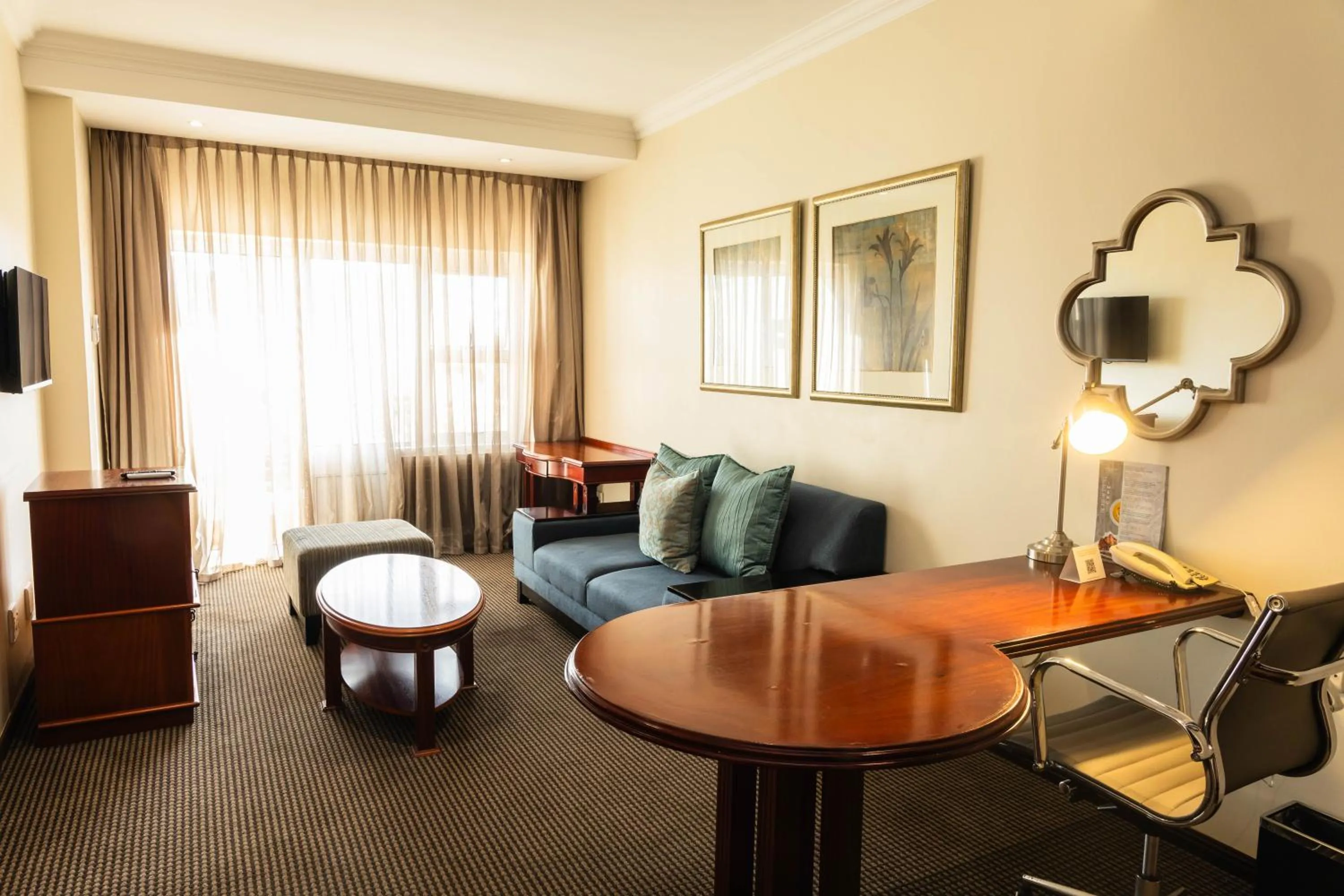 Living room in Premier Hotel Regent