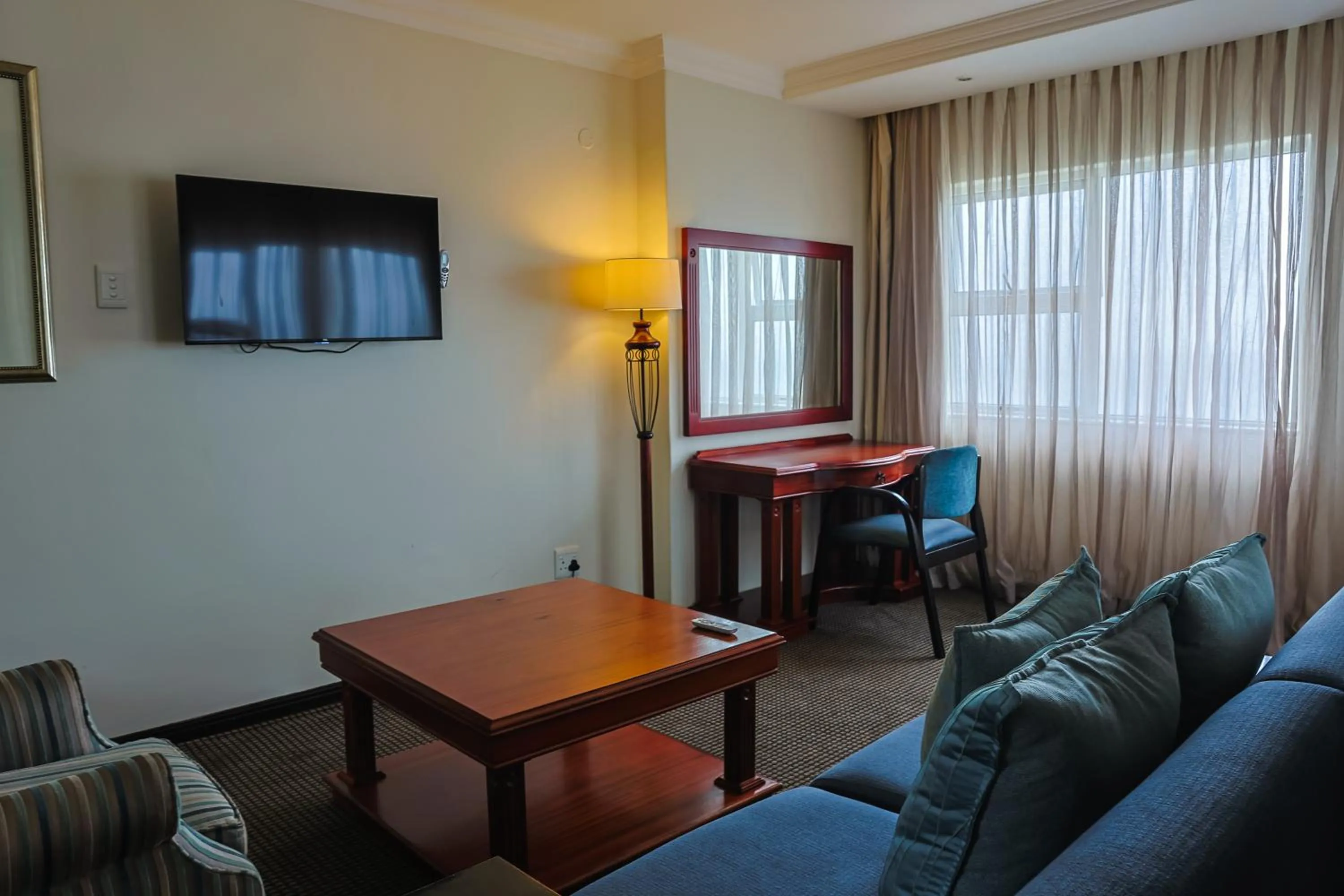 Living room in Premier Hotel Regent