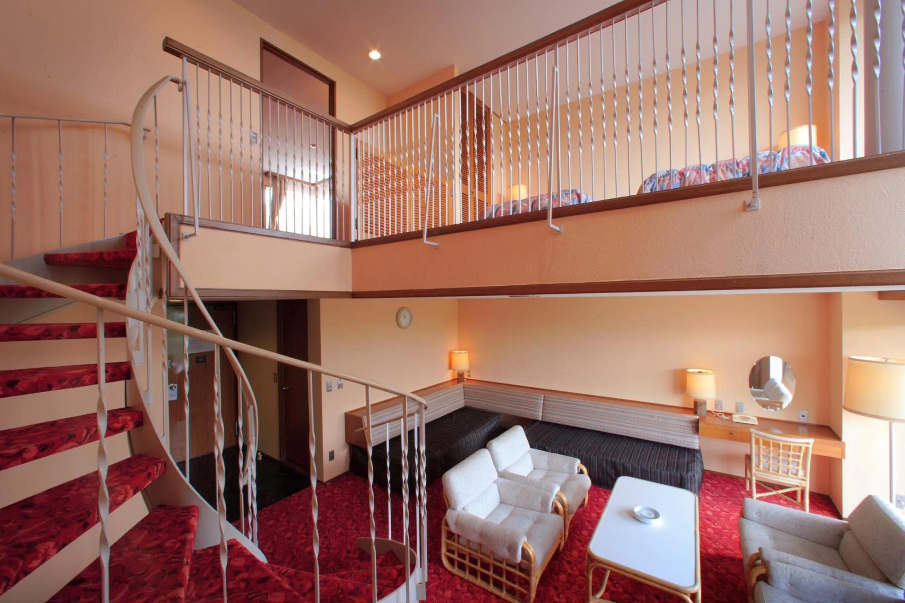 Living room, Bed in Kamogawa Grand Hotel