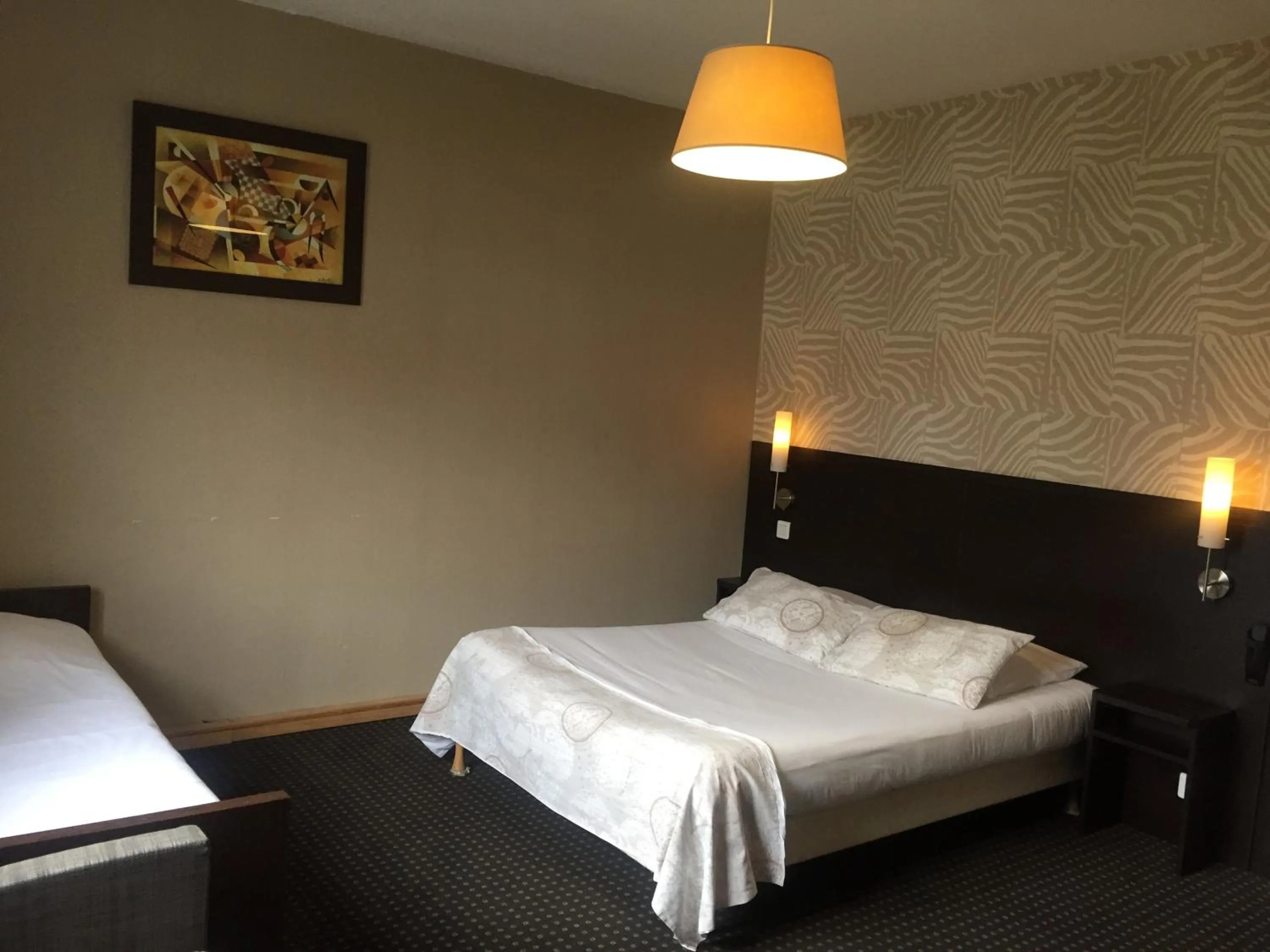 Bedroom in Hotel Restaurant Cousseau