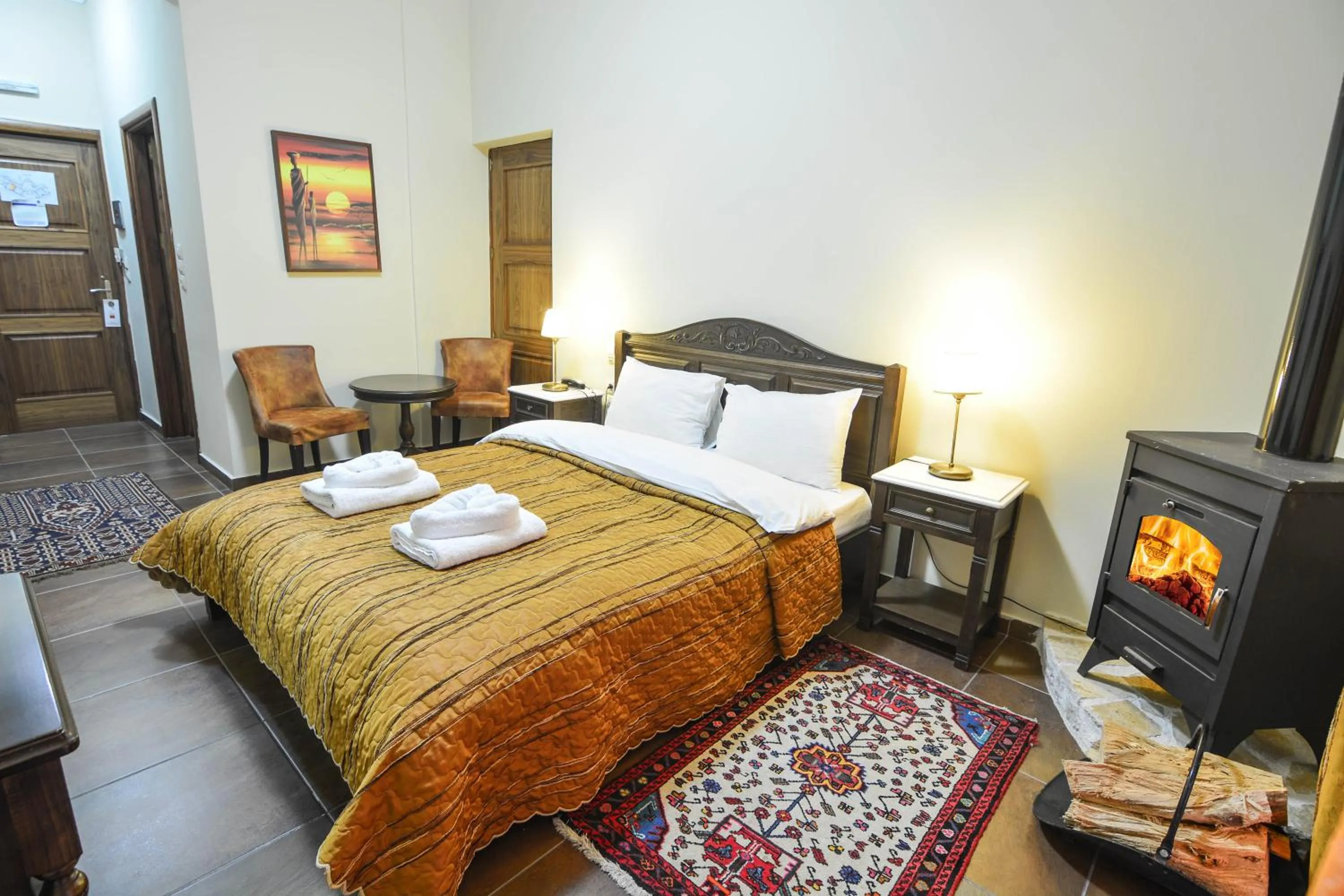 Bed in Hotel Iliovasilema