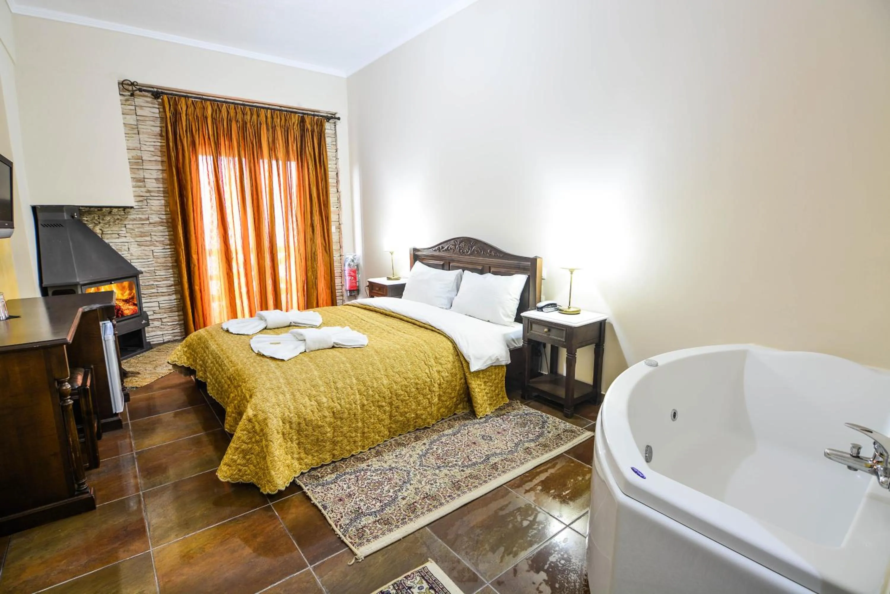 Bed in Hotel Iliovasilema