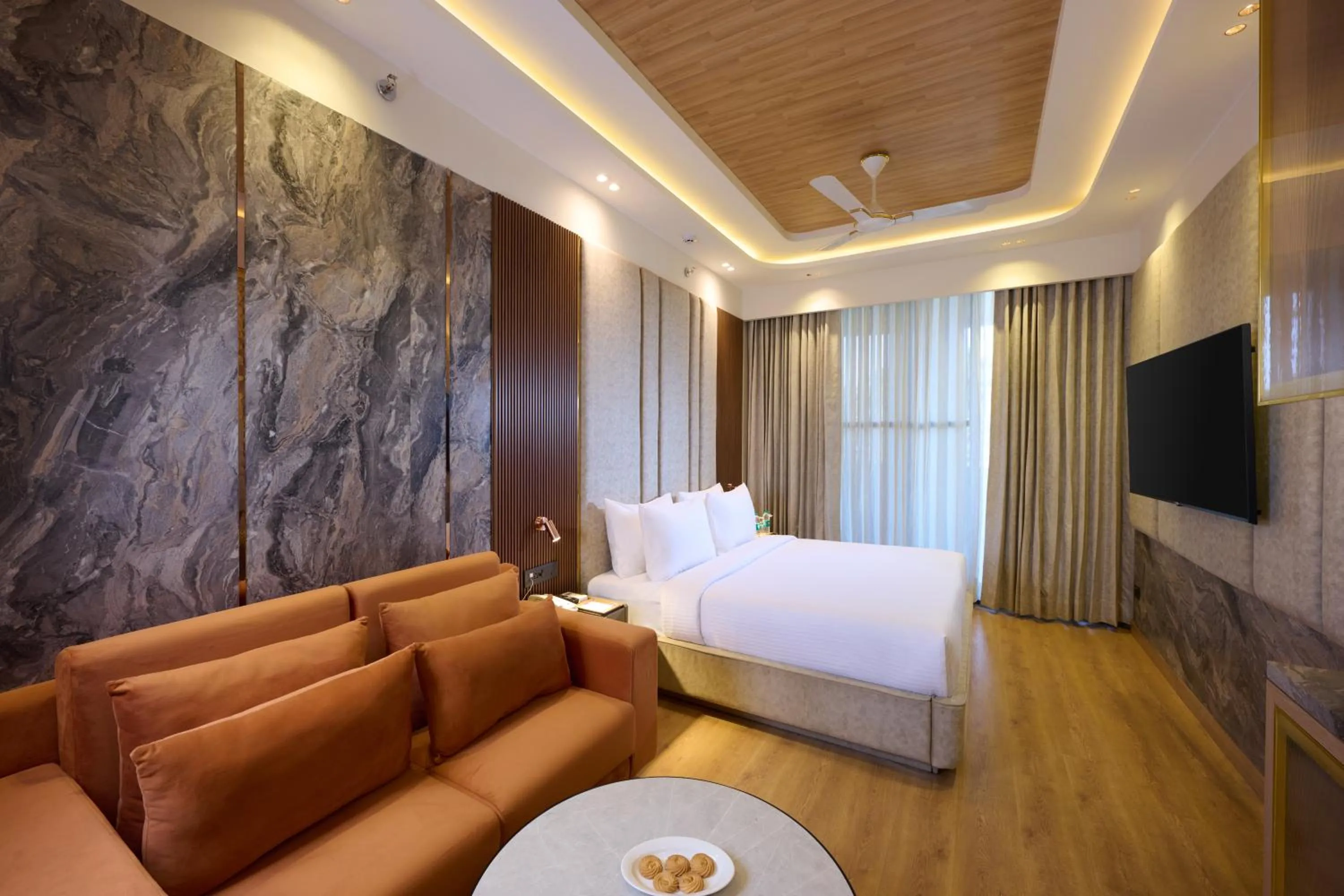 Bedroom, Bed in Tulip Inn Gurugram Sector 39