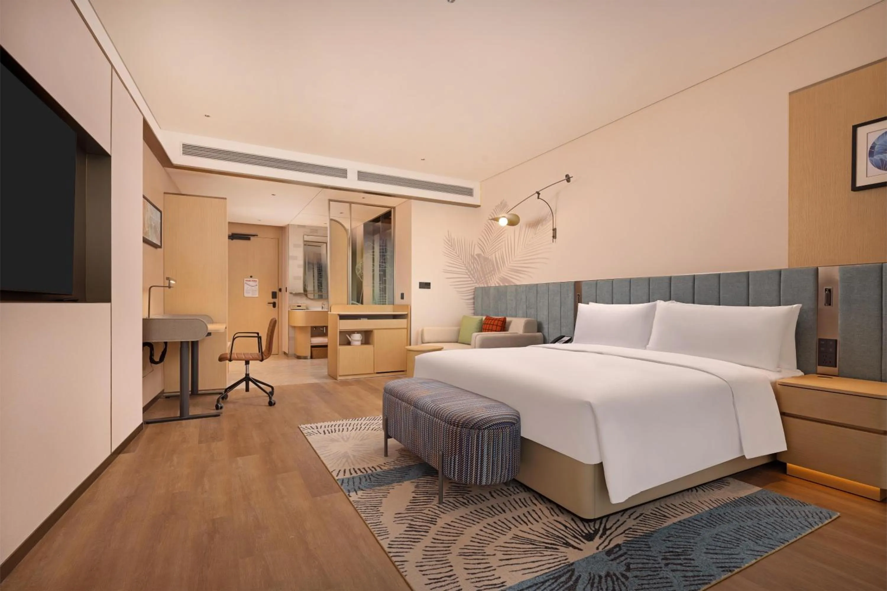 Living room, Bed in Hilton Garden Inn Huangshi Dinosaur Wonderland