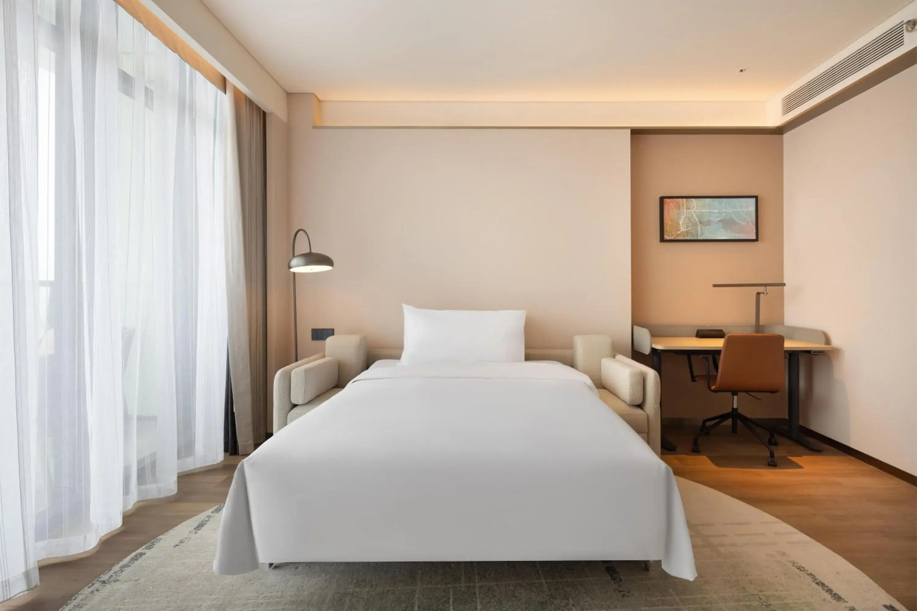 Deluxe King Room with Sofa Bed in Hilton Garden Inn Huangshi Dinosaur Wonderland Deluxe King Room with Sofa Bed in Hilton Garden Inn Huangshi Dinosaur Wonderland