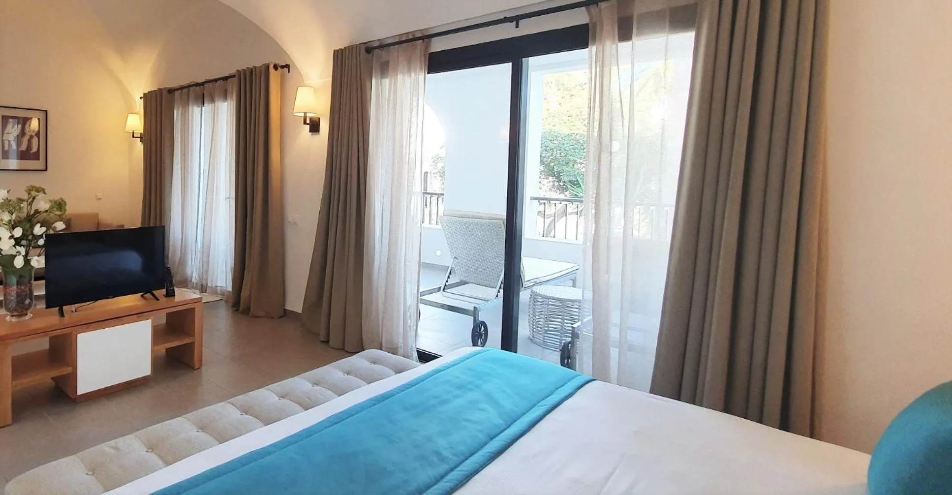 Bed in Les Orangers Garden Villas and Bungalows Ultra All inclusive