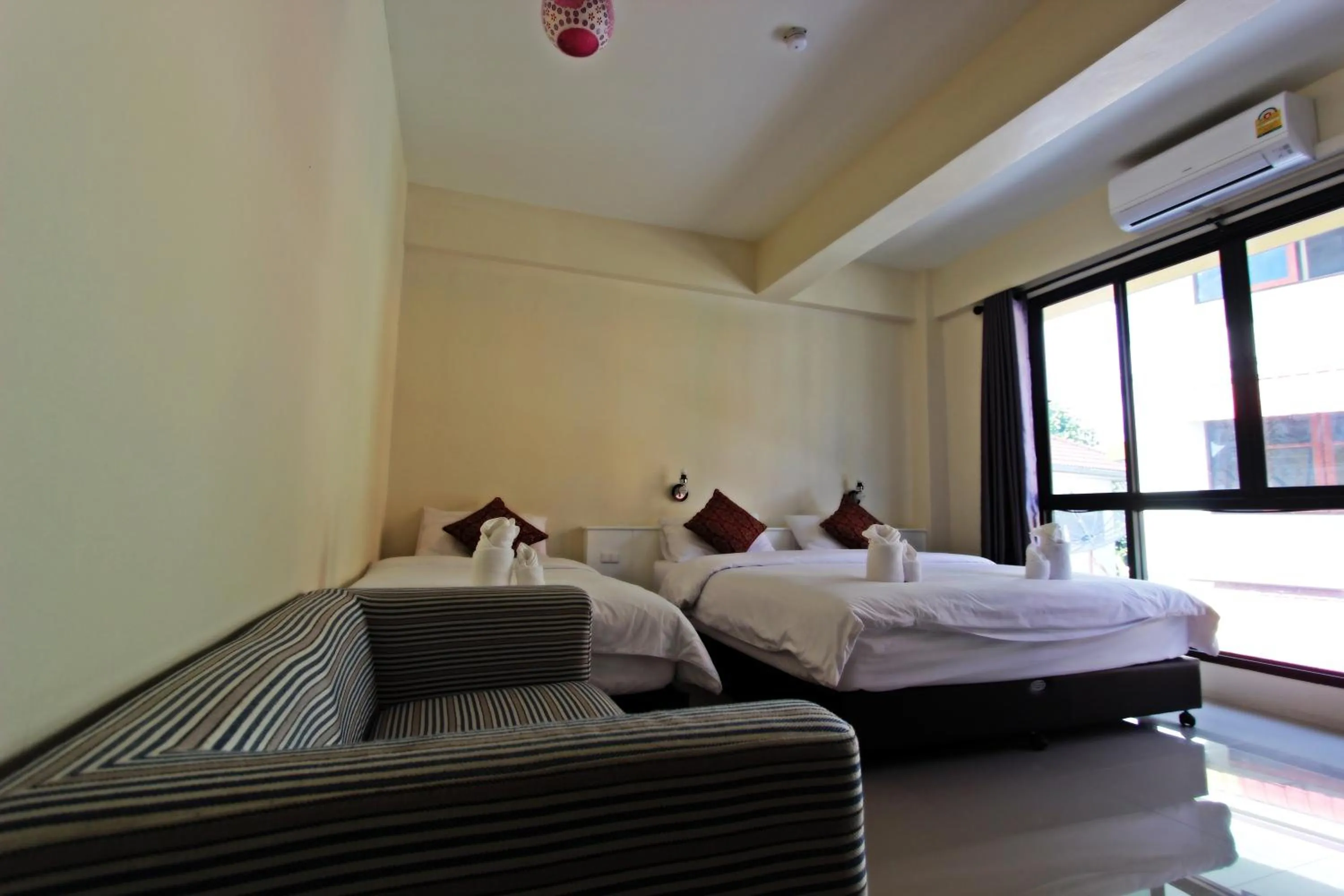 Bed in Baan Pordeedin