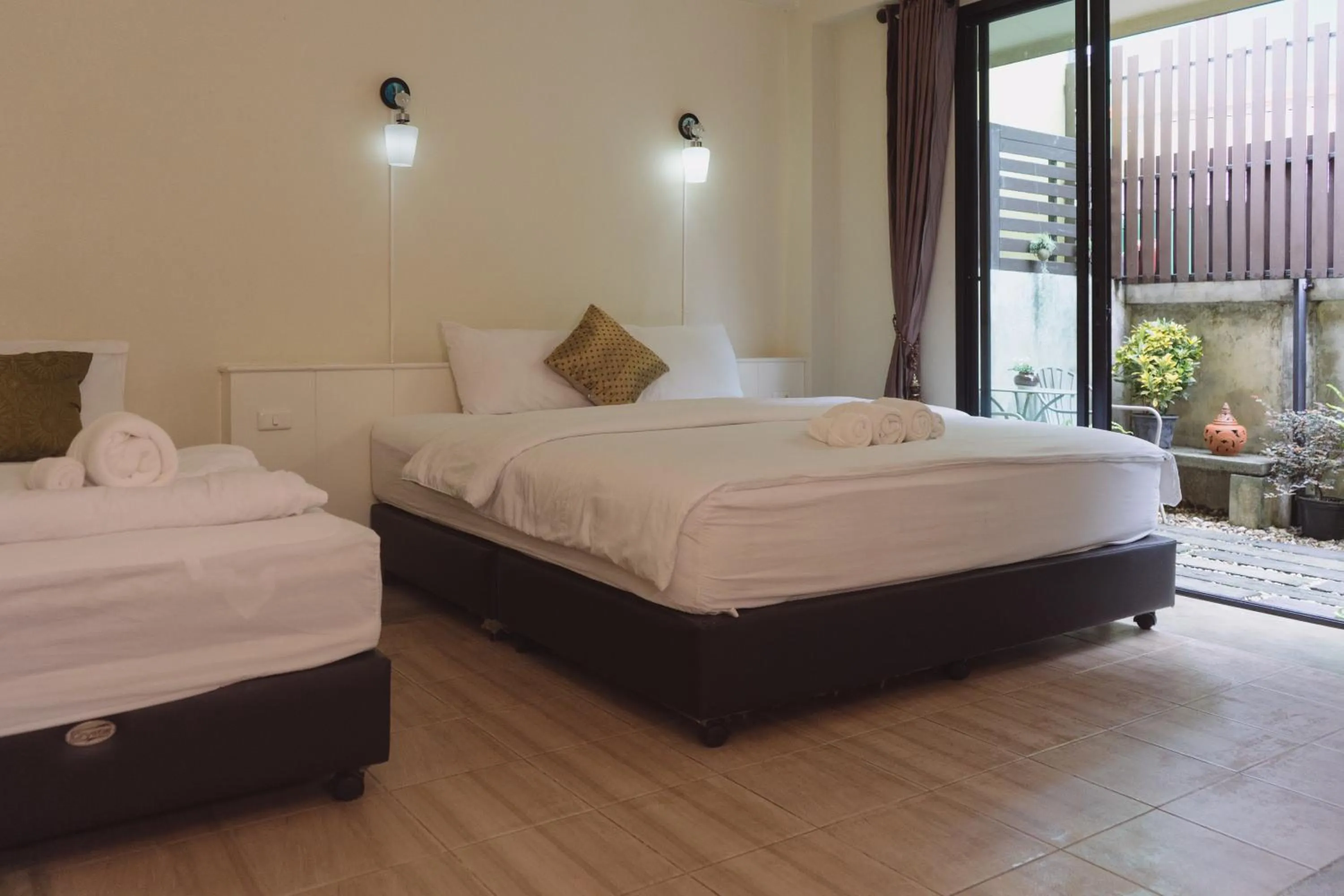 Bed in Baan Pordeedin