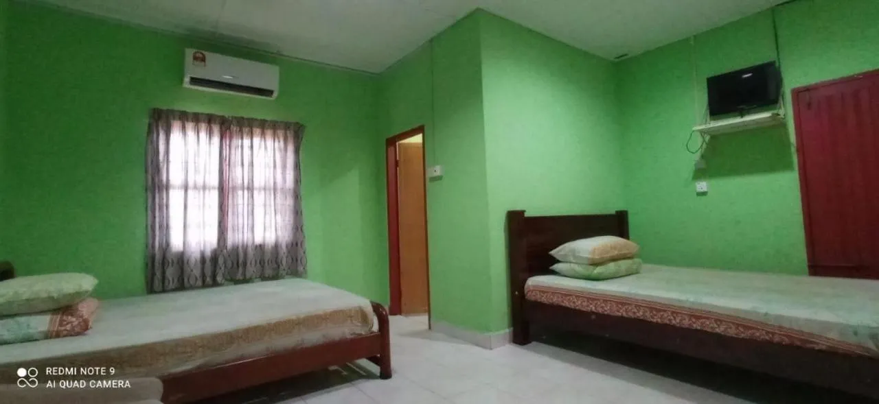 Bed in Bayu Beach Chalet PCB