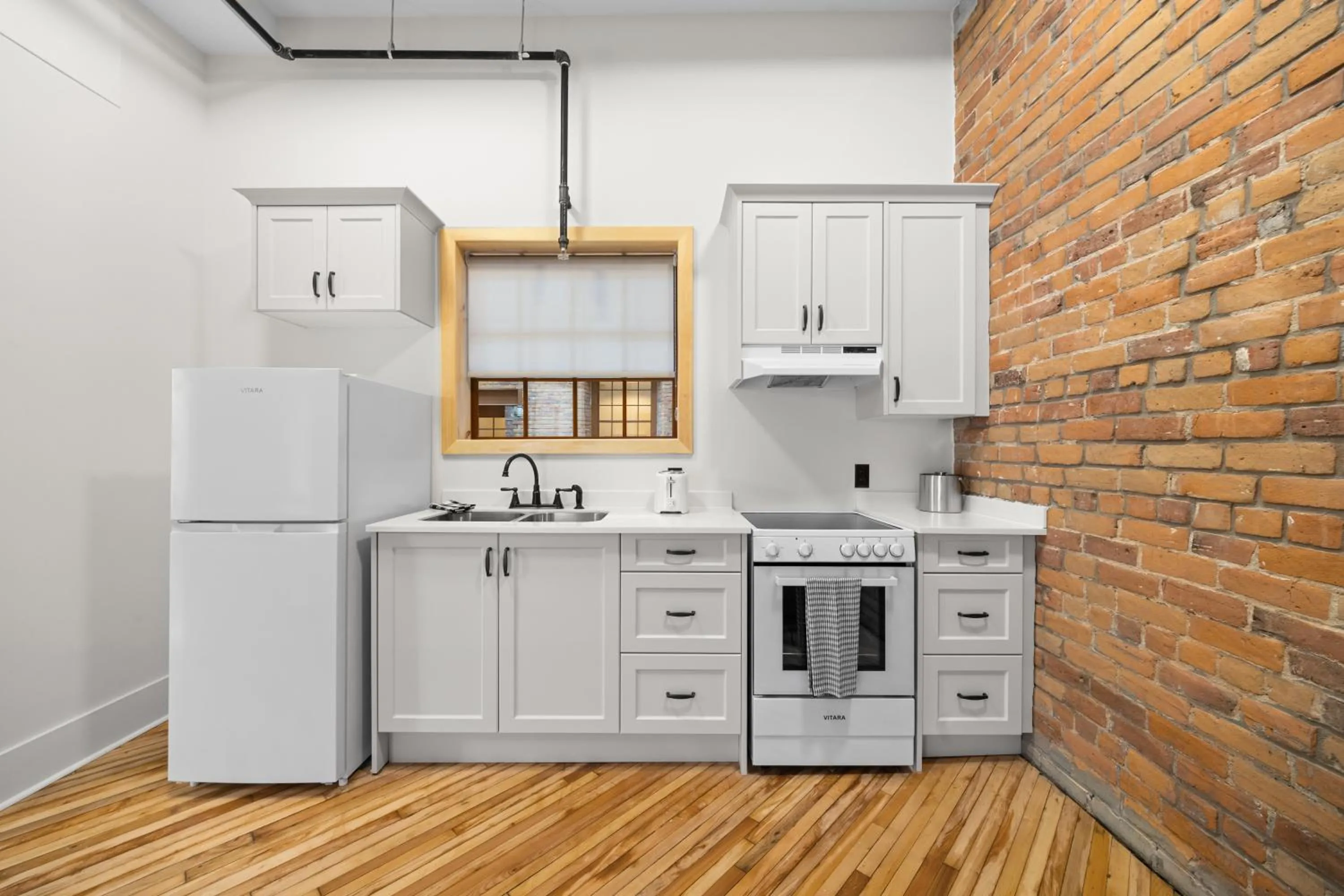 One-Bedroom Suite in Tri Century Mill Suites