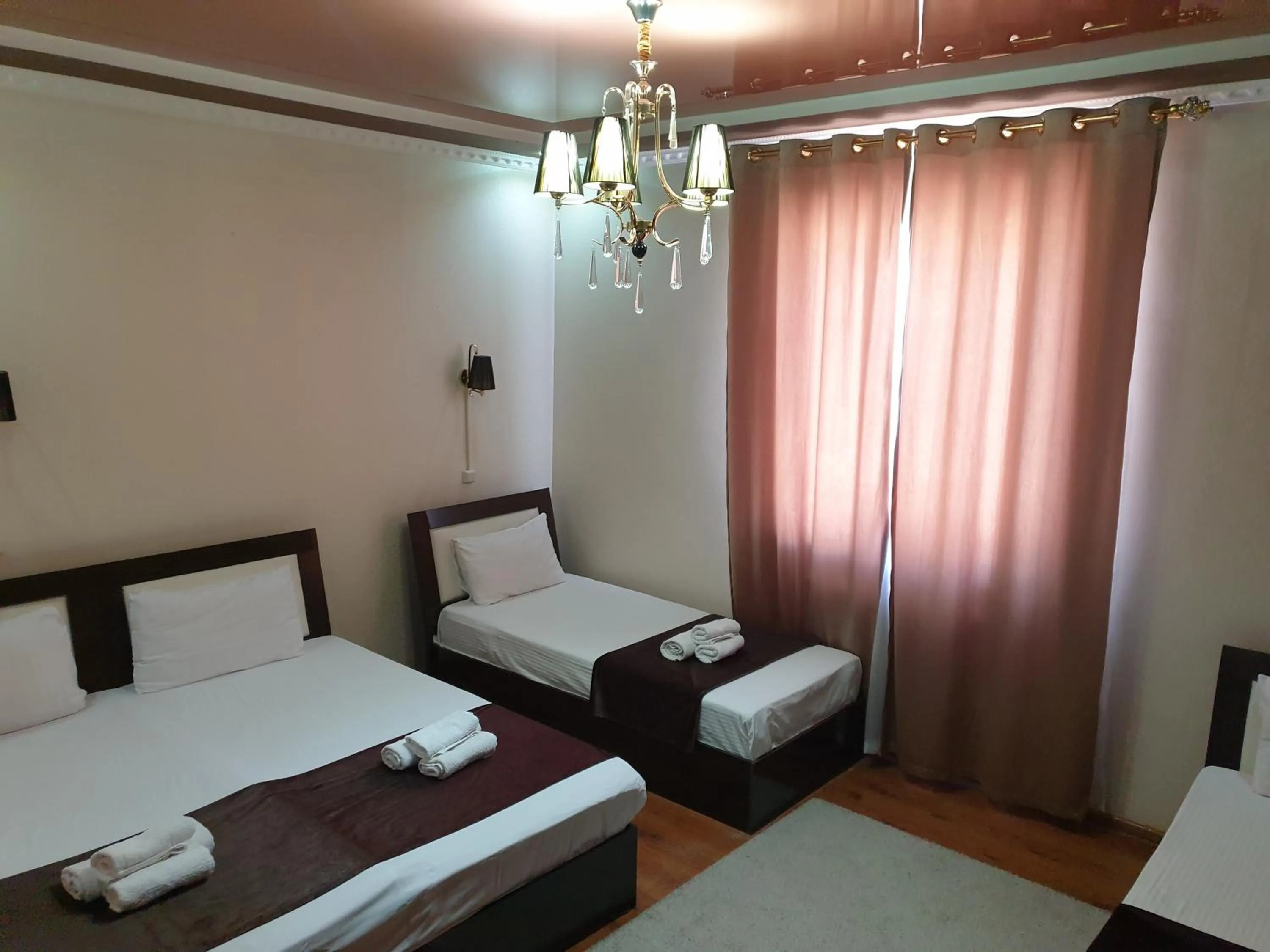 Photo of the whole room, Bed in Hotel Euro Asia Khiva in Ichan Qala