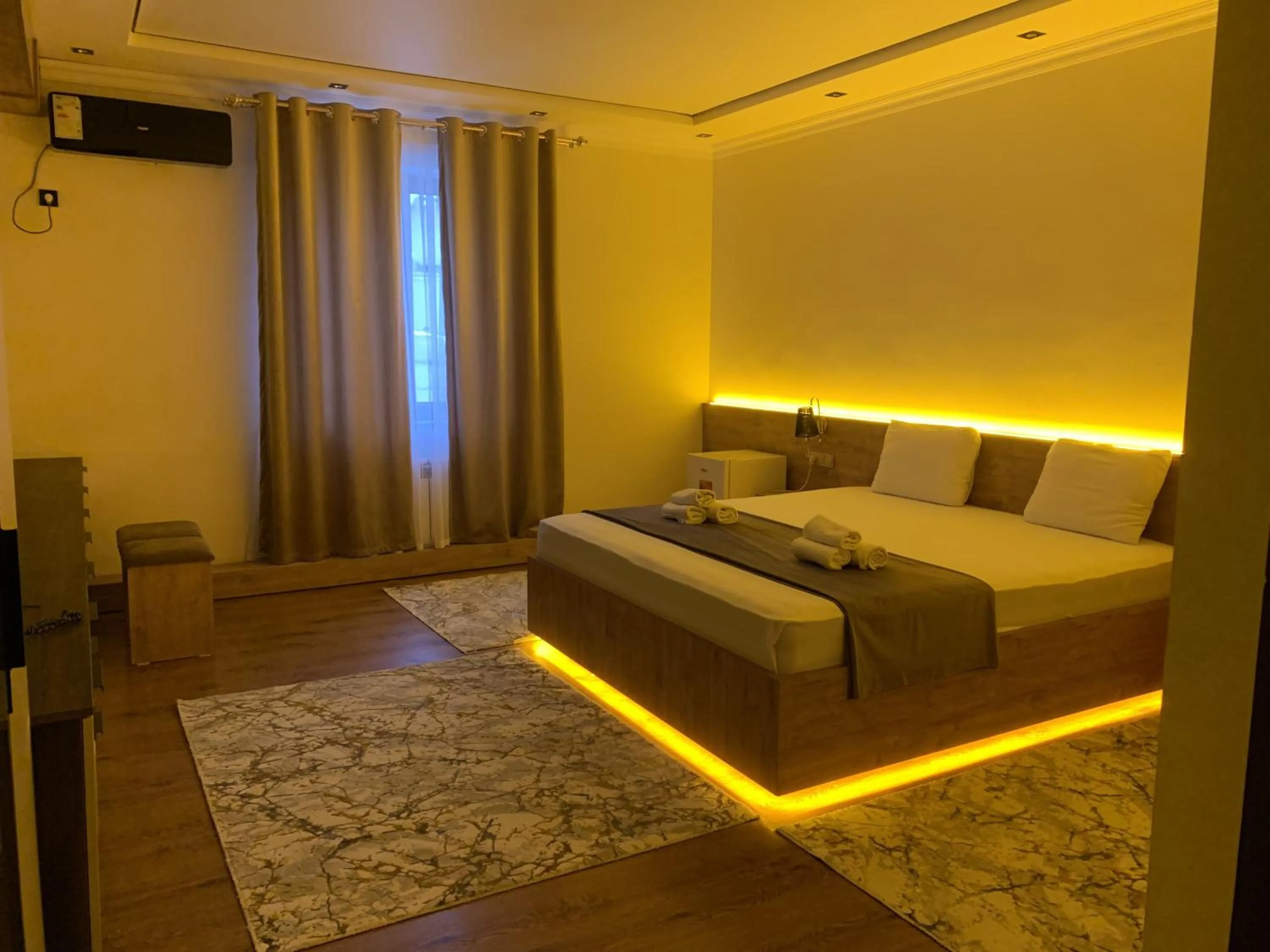 Photo of the whole room, Bed in Hotel Euro Asia Khiva in Ichan Qala