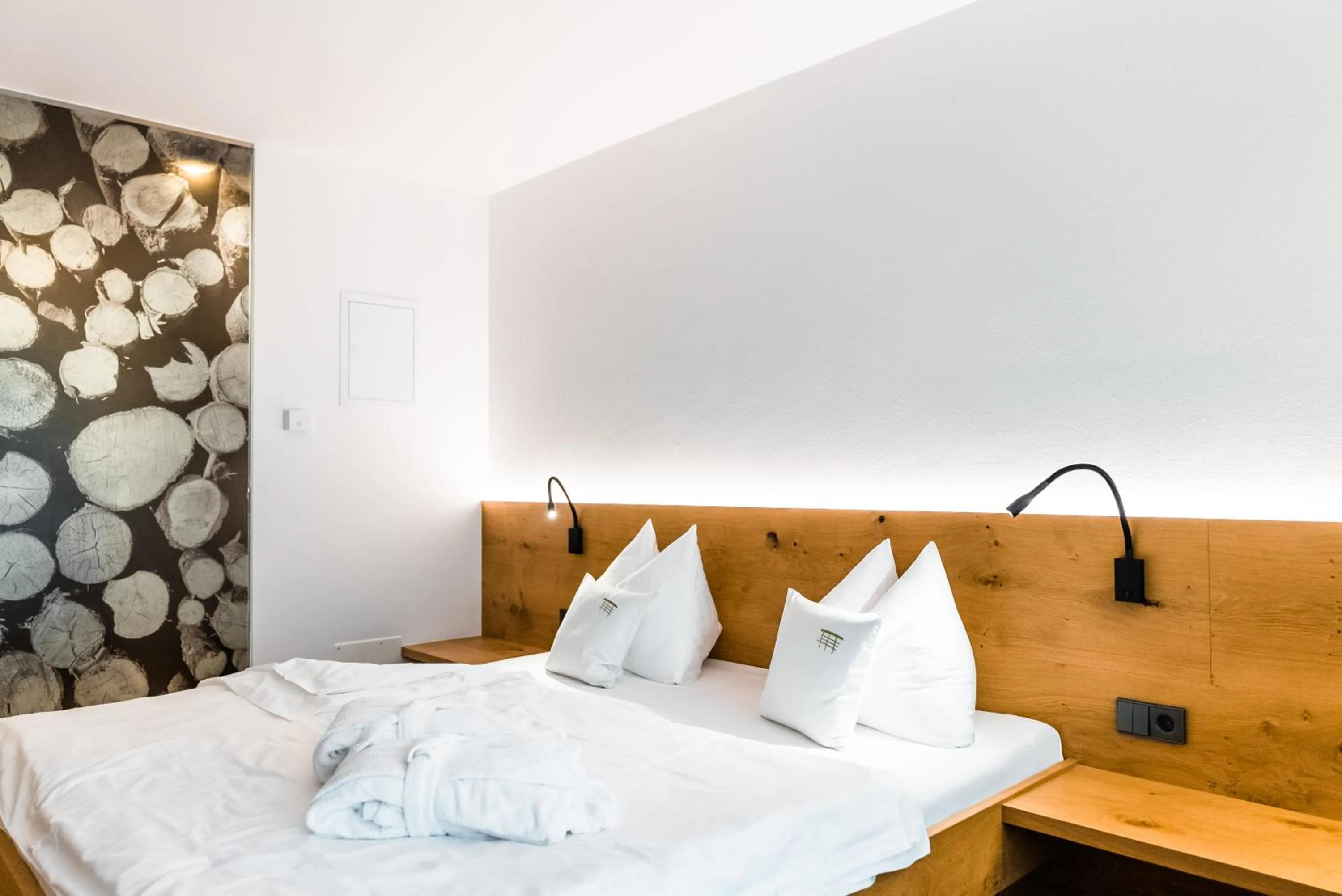 Bed in JOAS natur.hotel.b&b