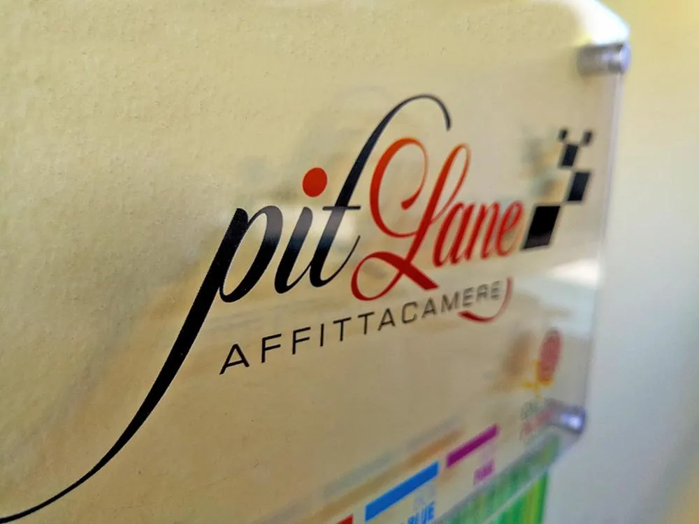 Property logo or sign in Pit Lane AFFITTACAMERE