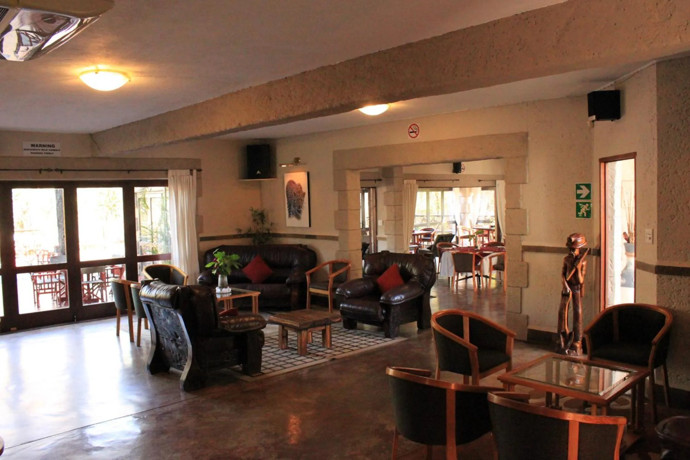 Communal lounge/ TV room in Grand Kruger Lodge and Spa