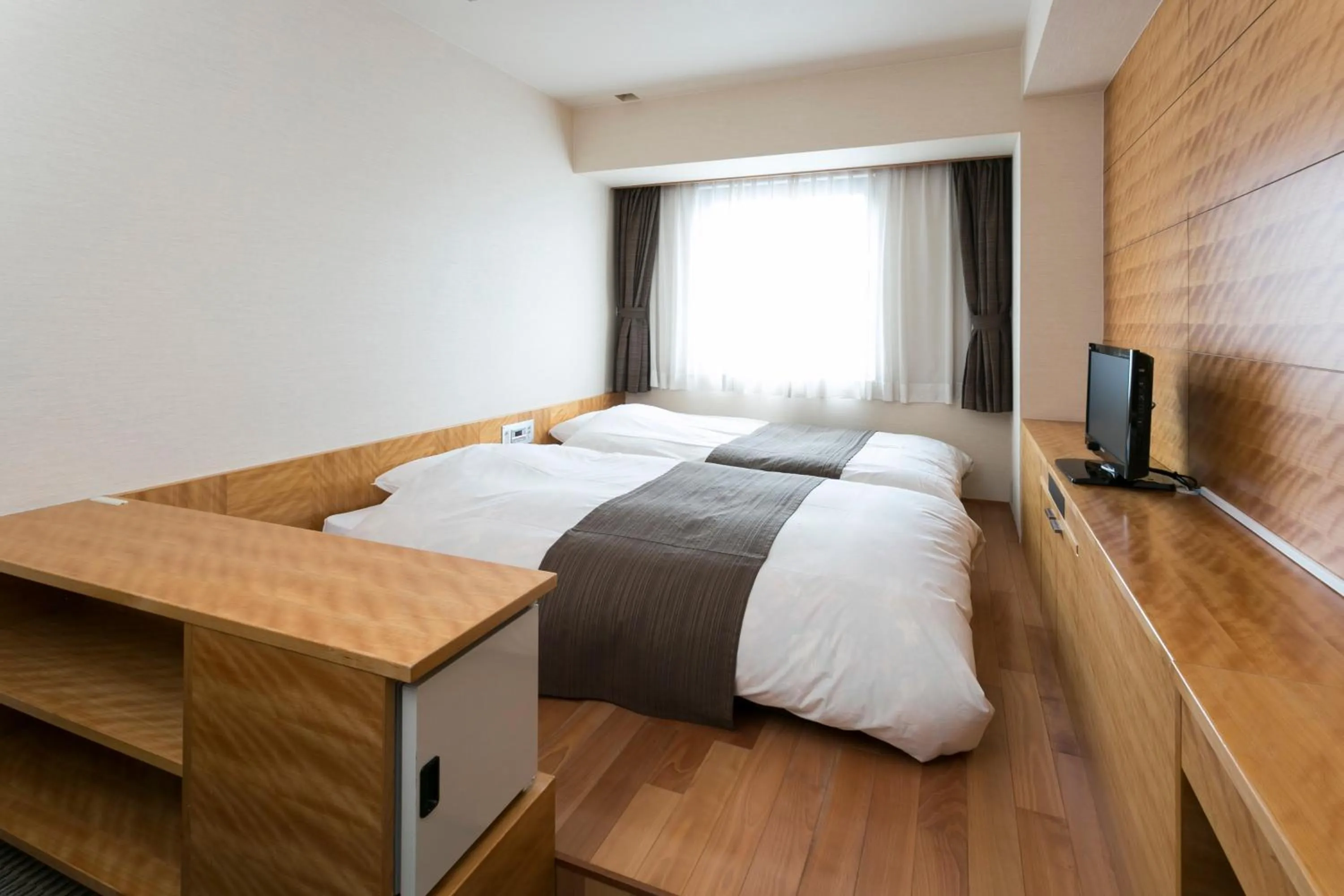 Photo of the whole room, Bed in Hotel Sunshine Tokushima