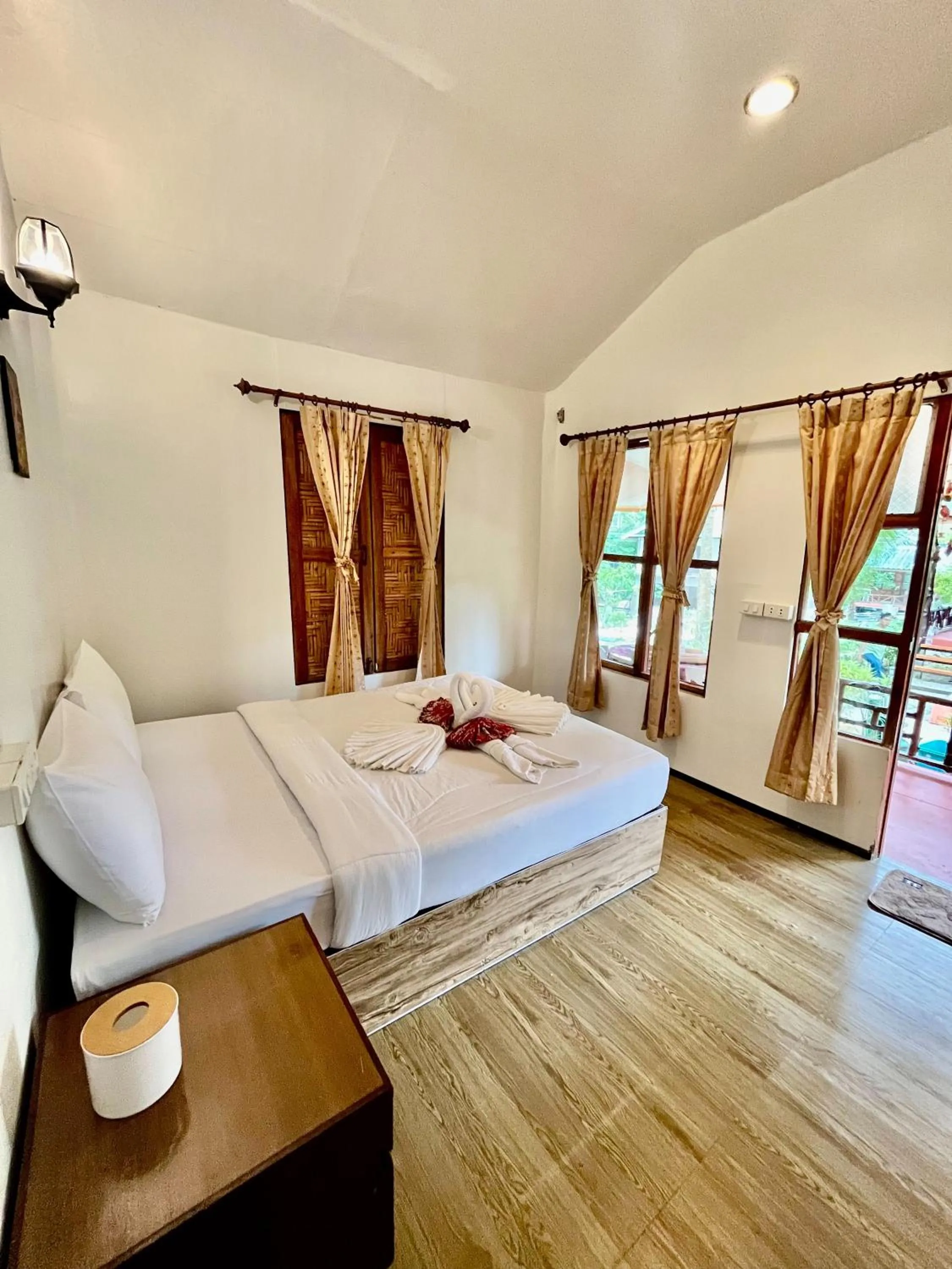 Bed in Koh Mook Garden Beach Resort