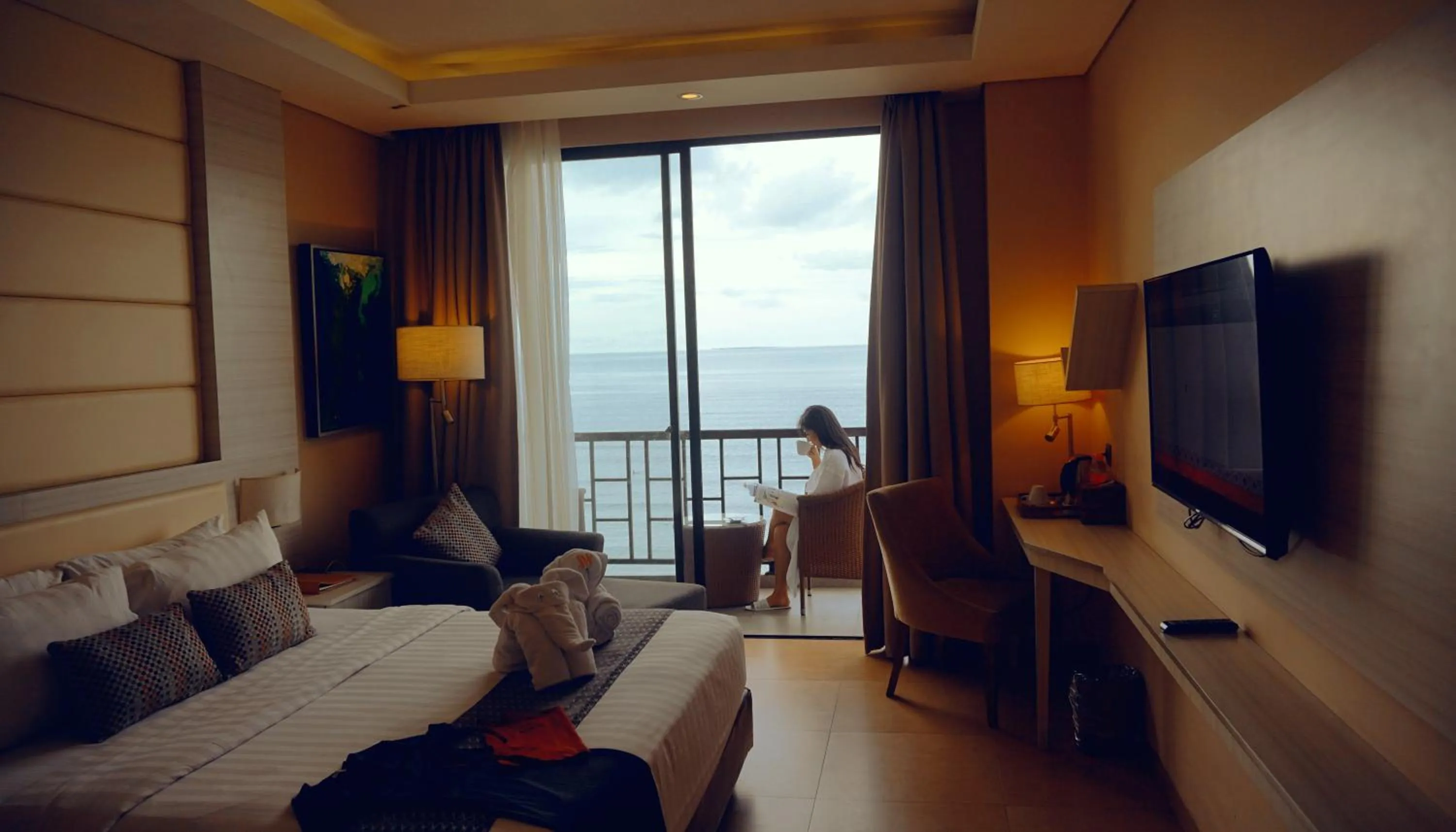 Seating area, Bed in Sotis Hotel Kupang