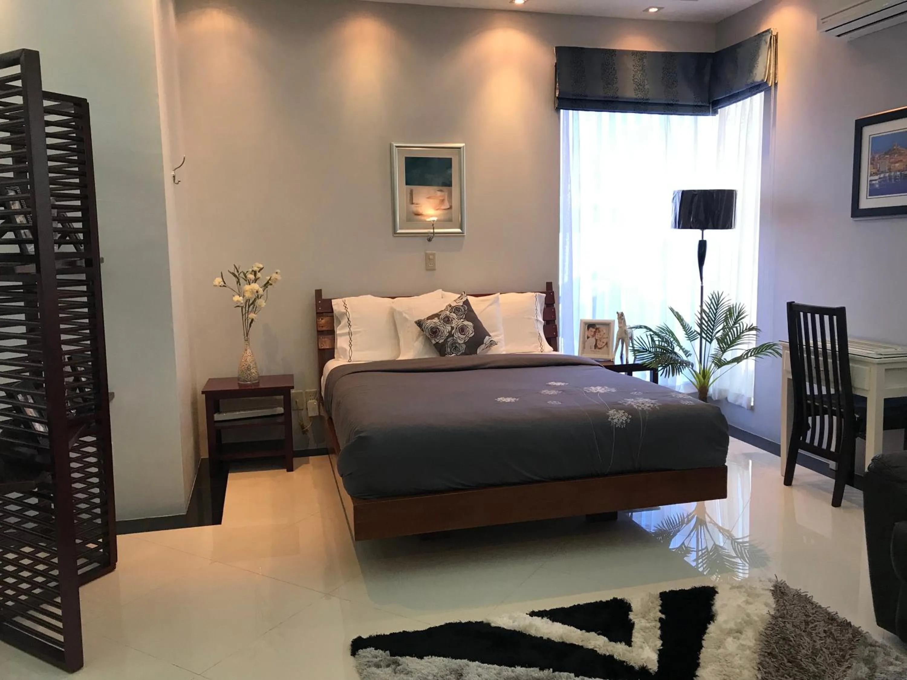 Living room, Bed in Anavada Suites - Davao City