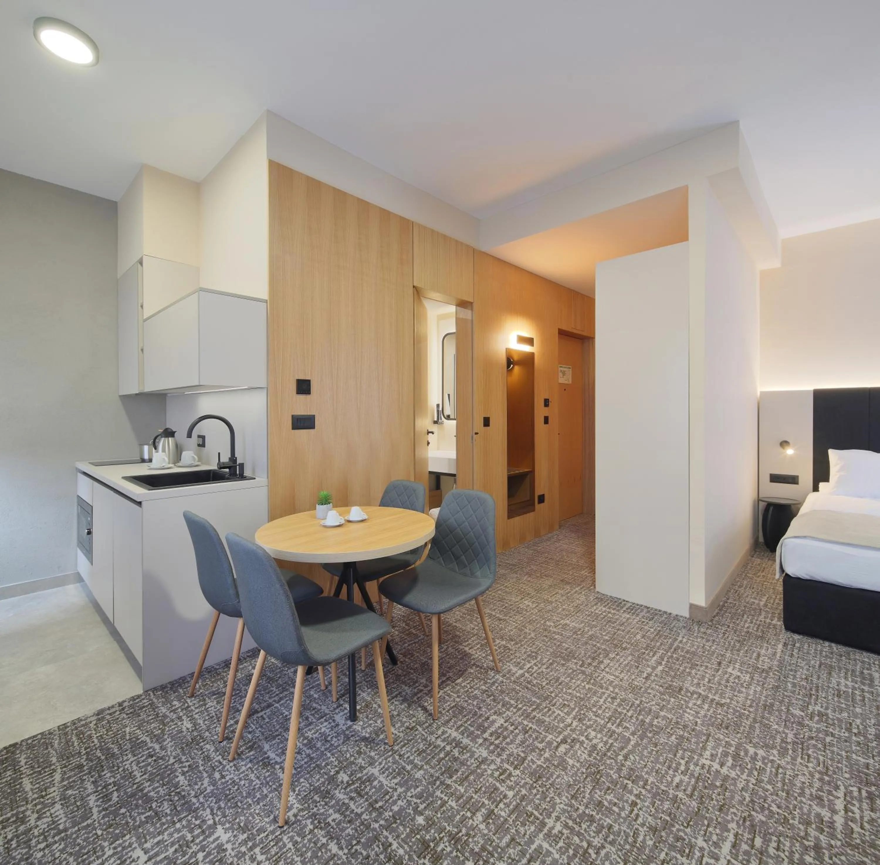 Kitchen or kitchenette, Bed in Hotel NOVA Inn Sarajevo