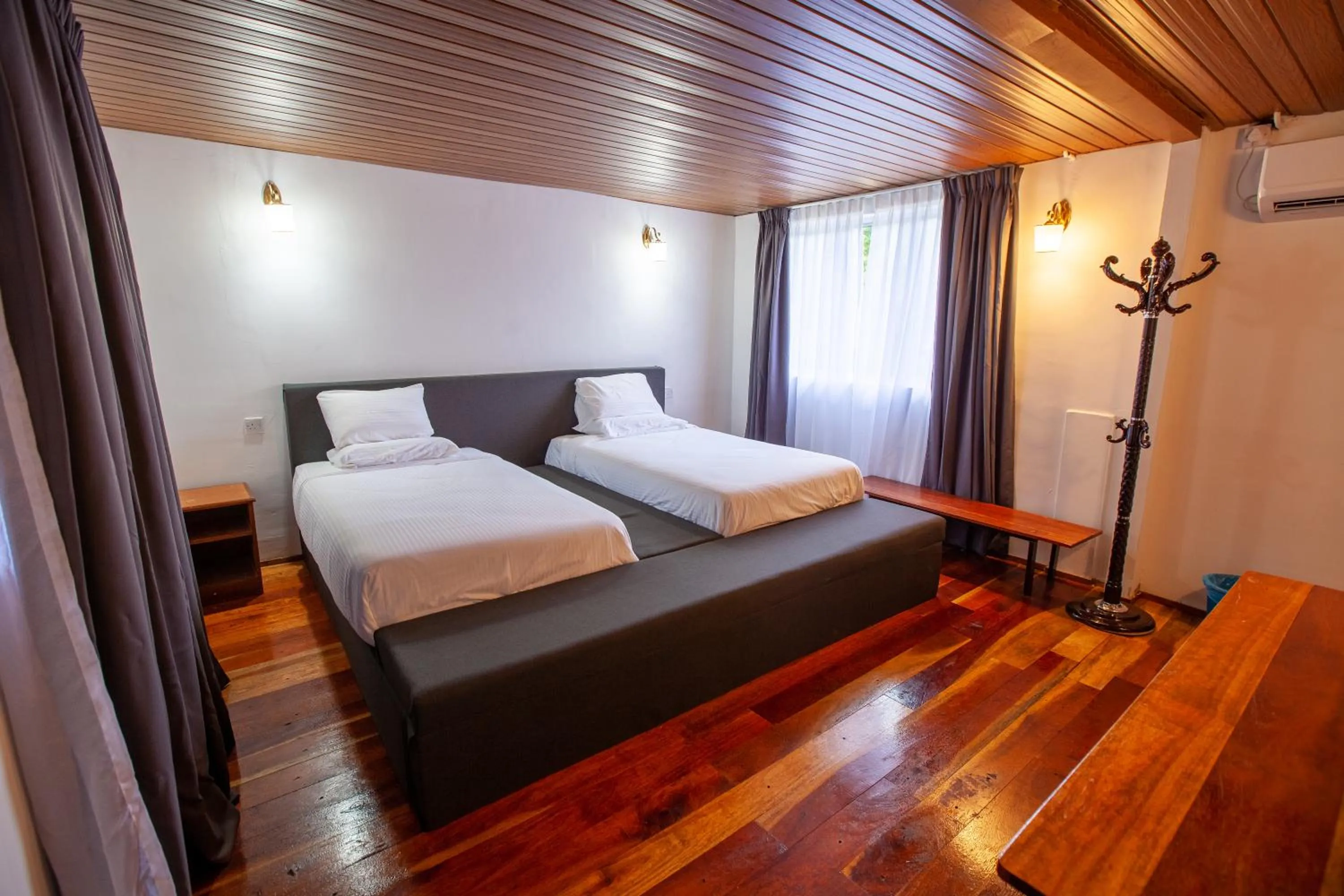 Bed in Joe Fisherman Inn