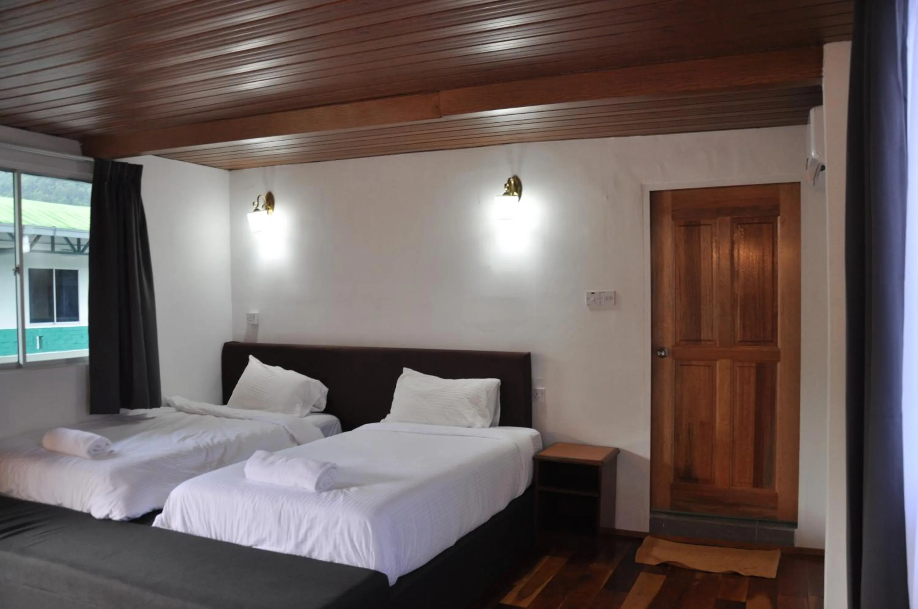 Bed in Joe Fisherman Inn