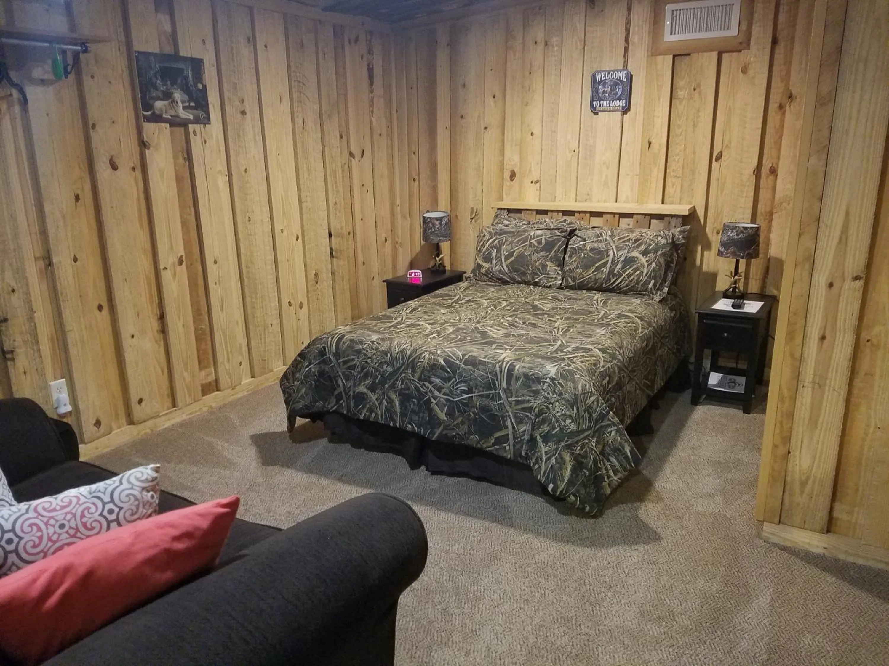 Bed in Red Fern Plantation Lodge