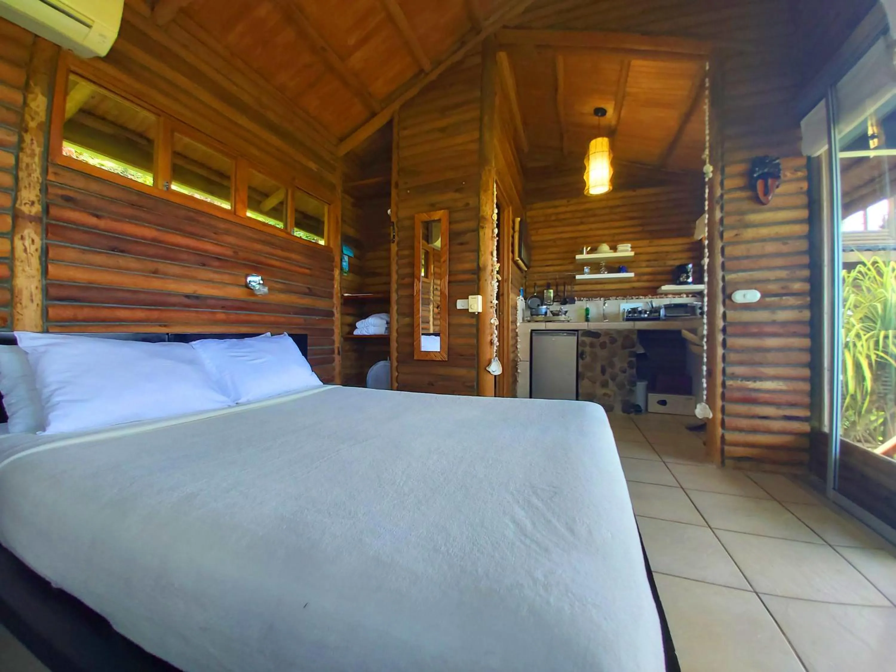 Bed in Horizon Hotel & Yoga center
