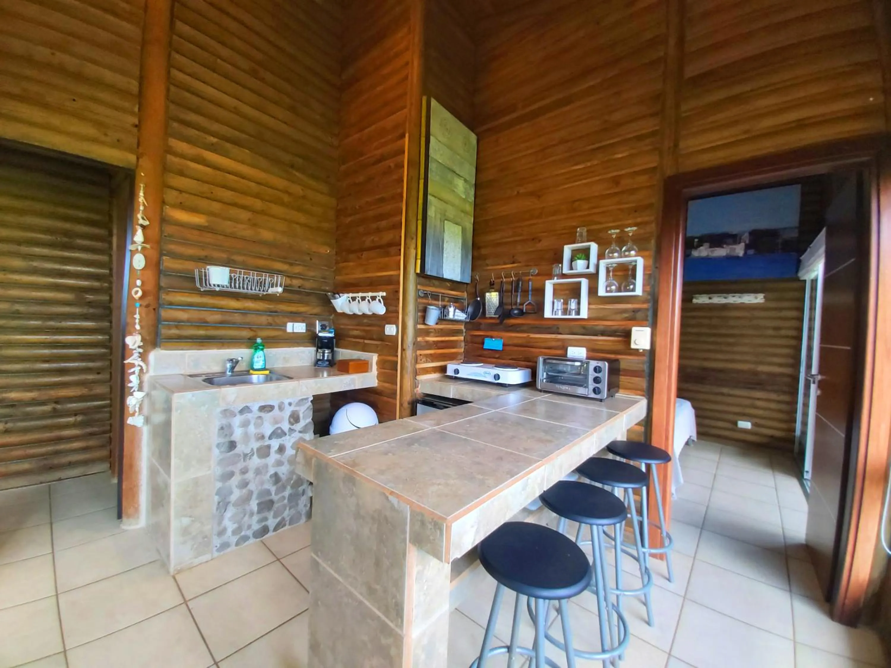 Kitchen or kitchenette in Horizon Hotel & Yoga center
