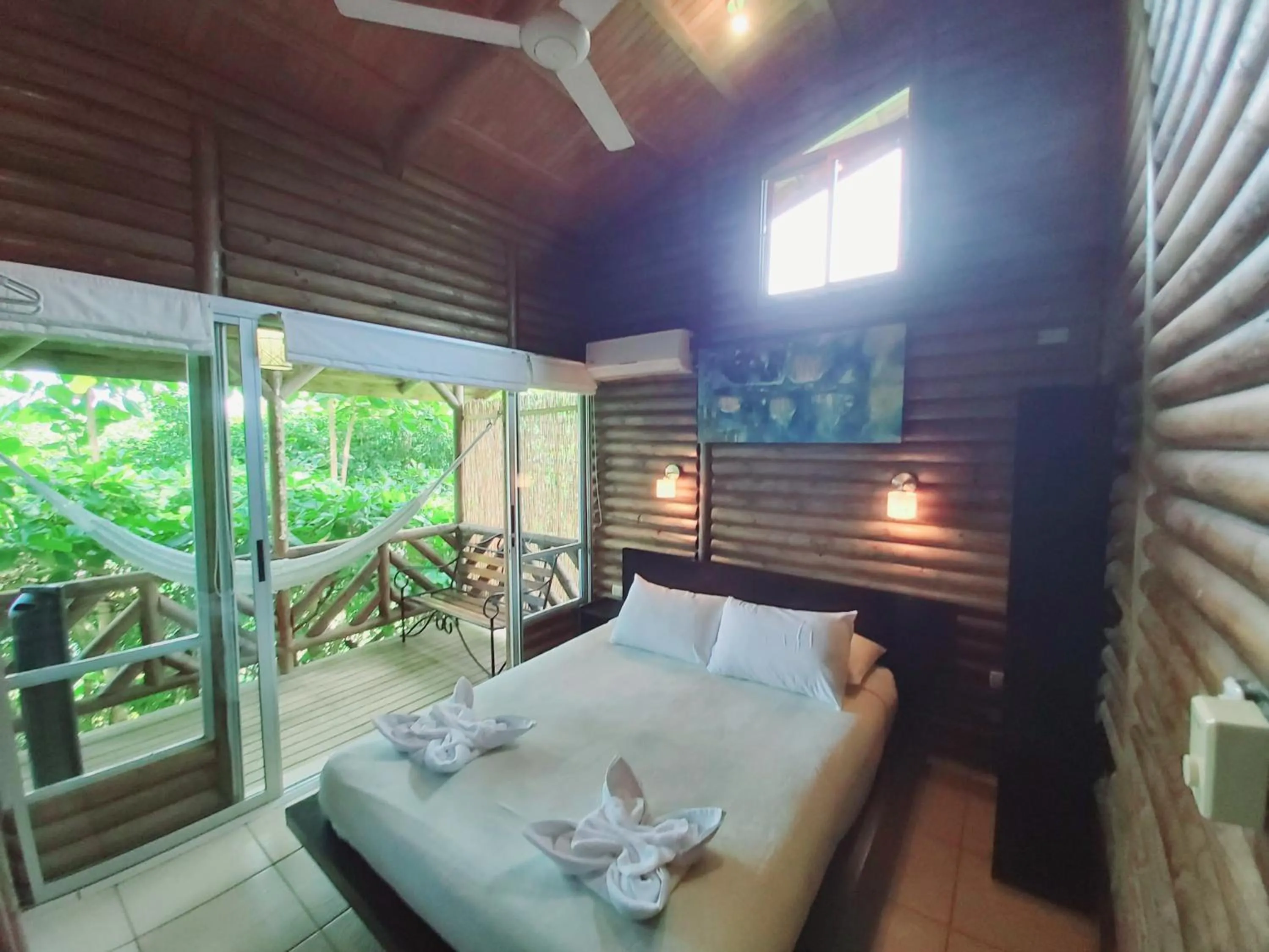 Bedroom, Bed in Horizon Hotel & Yoga center