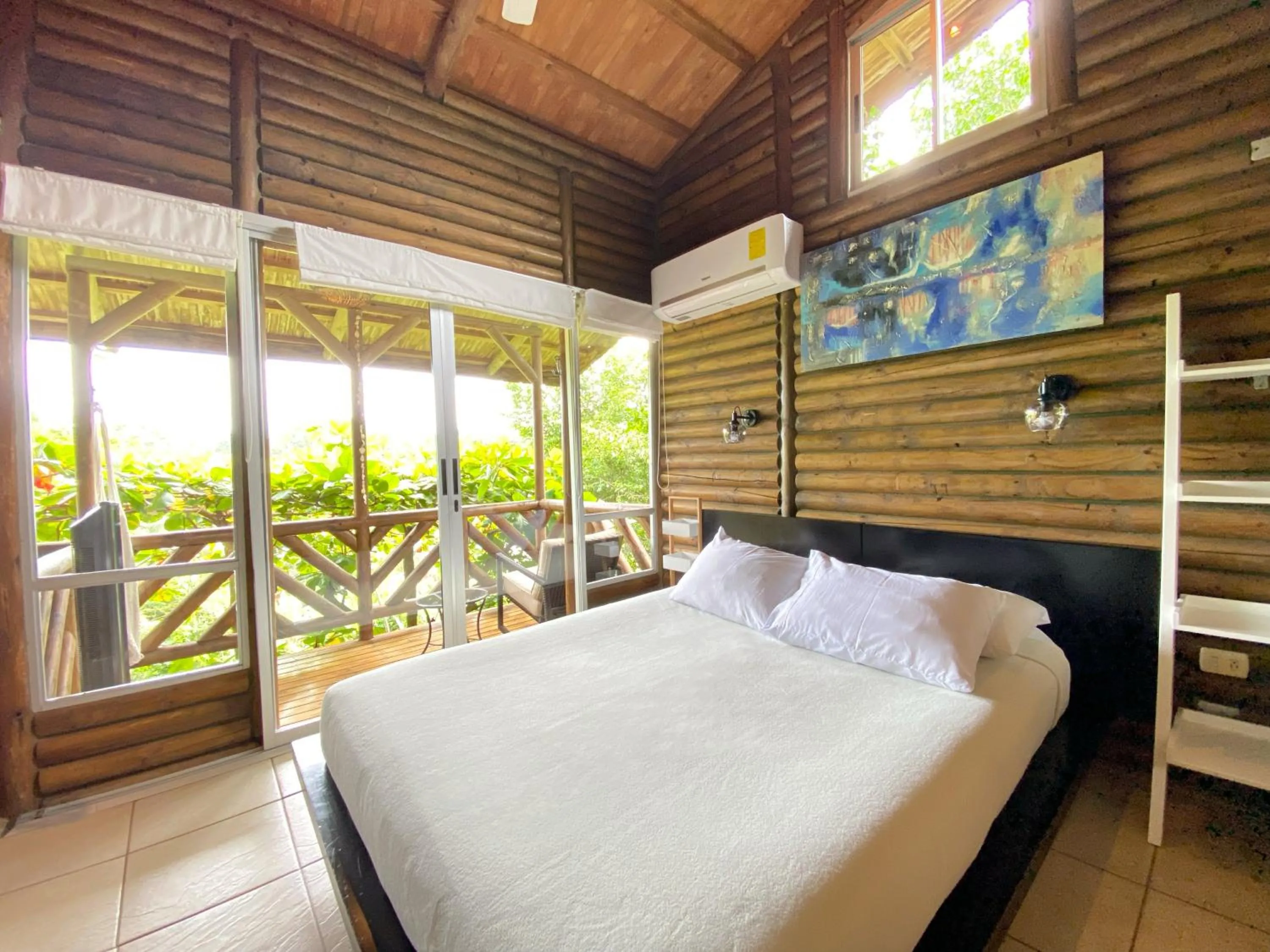 Bed in Horizon Hotel & Yoga center