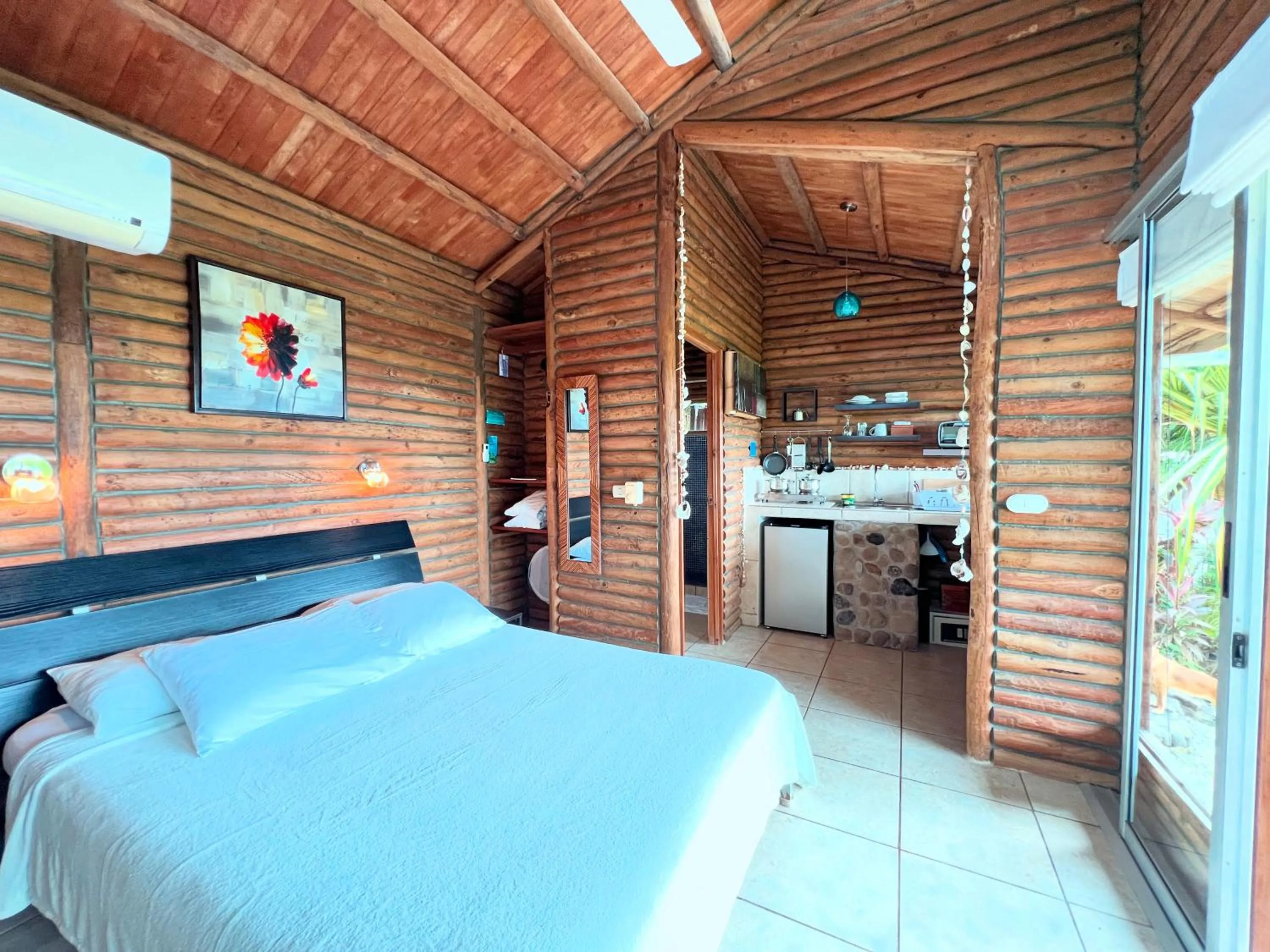 Bed in Horizon Hotel & Yoga center