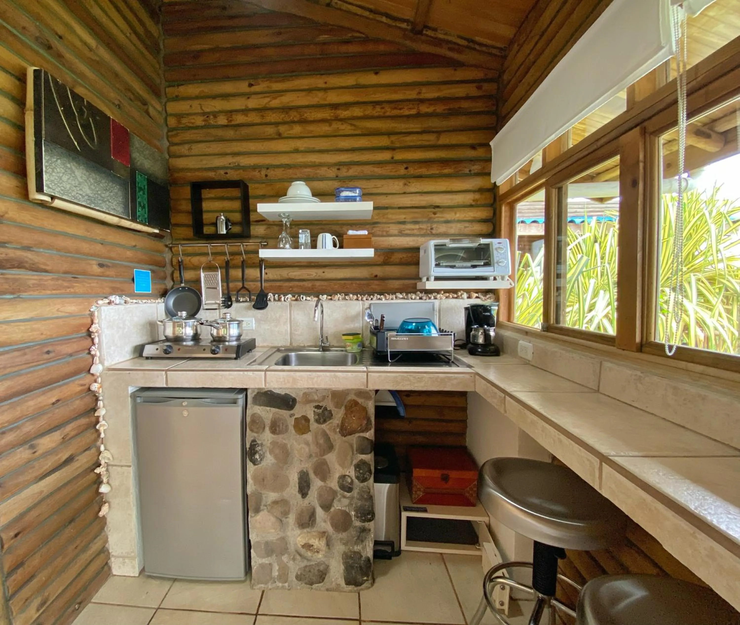 Kitchen or kitchenette in Horizon Hotel & Yoga center