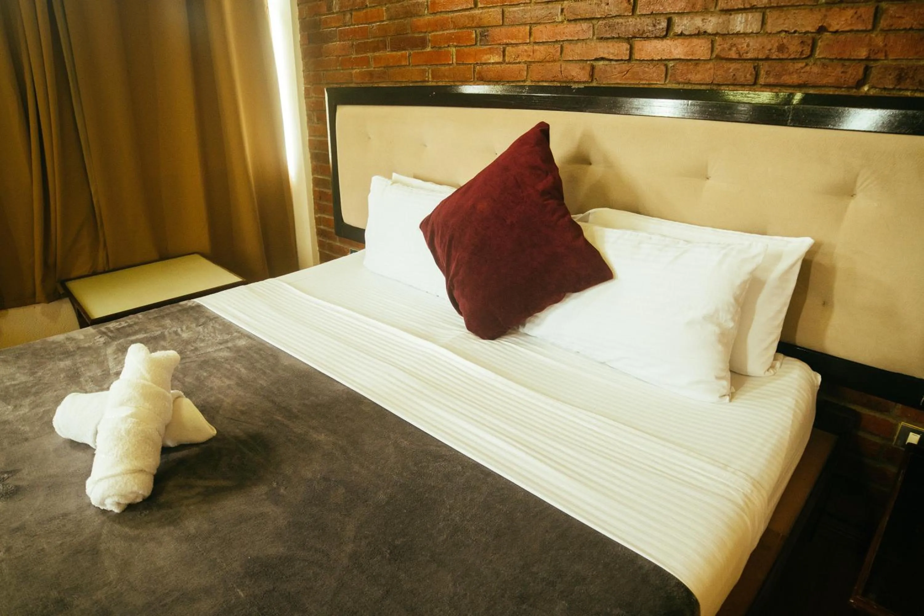 Bed in Marina Palawan Boutique Nature Resort