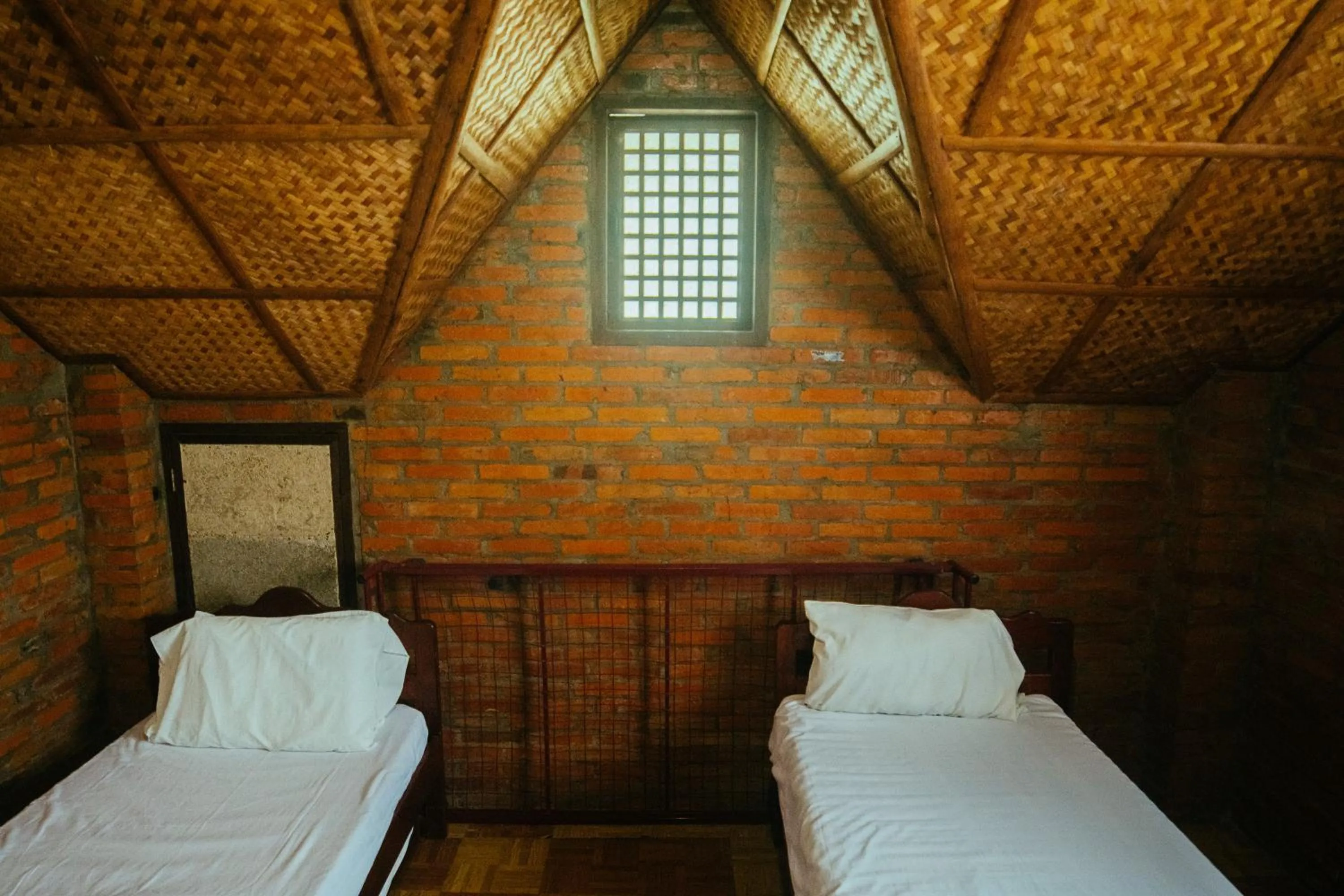 Bed in Marina Palawan Boutique Nature Resort