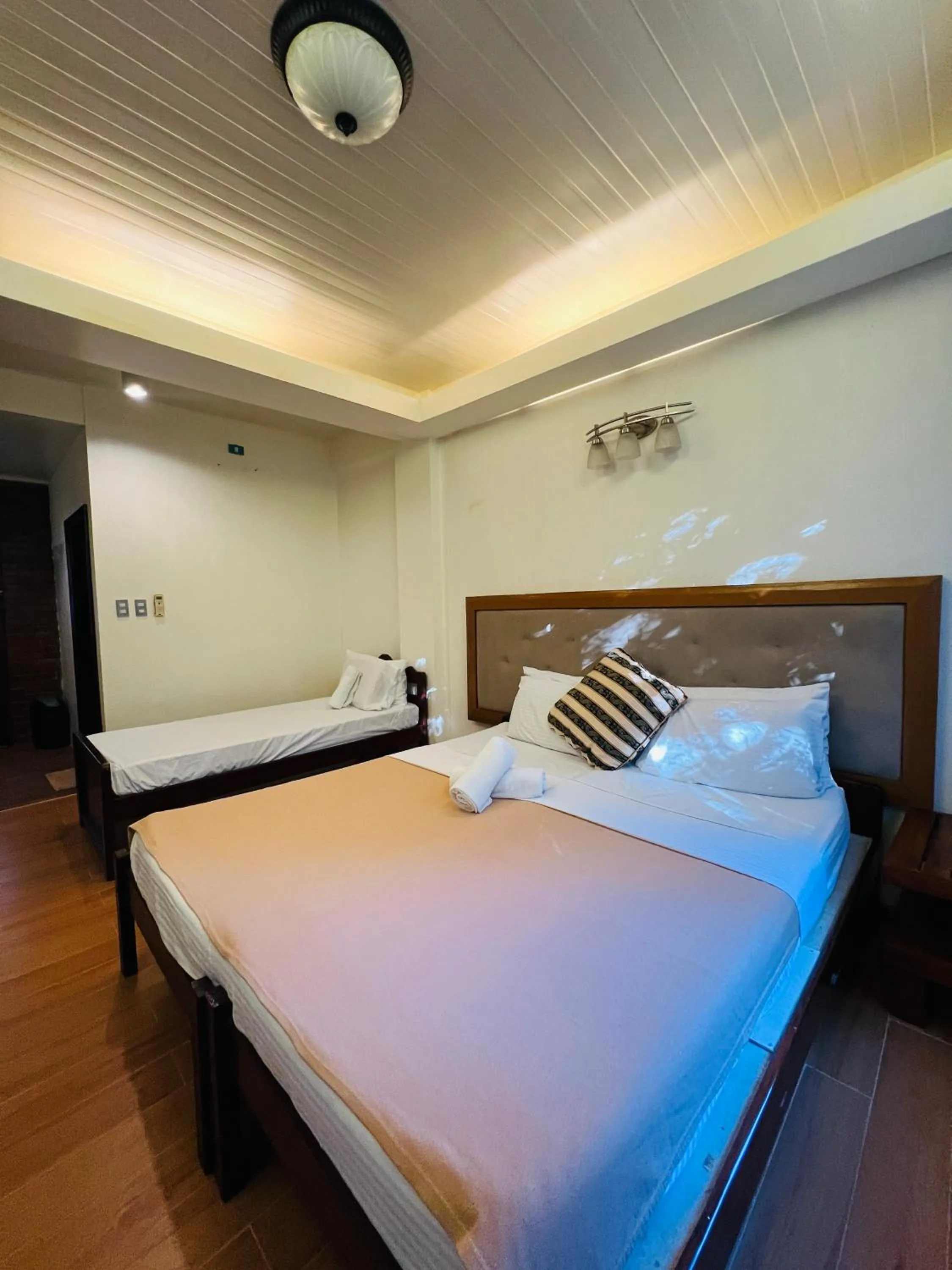 Bed in Marina Palawan Boutique Nature Resort