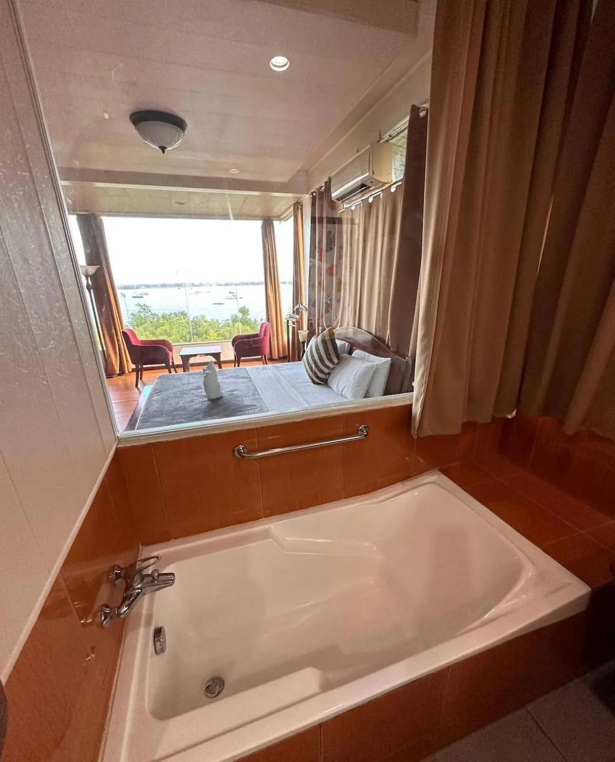 Bathroom, Bed in Marina Palawan Boutique Nature Resort