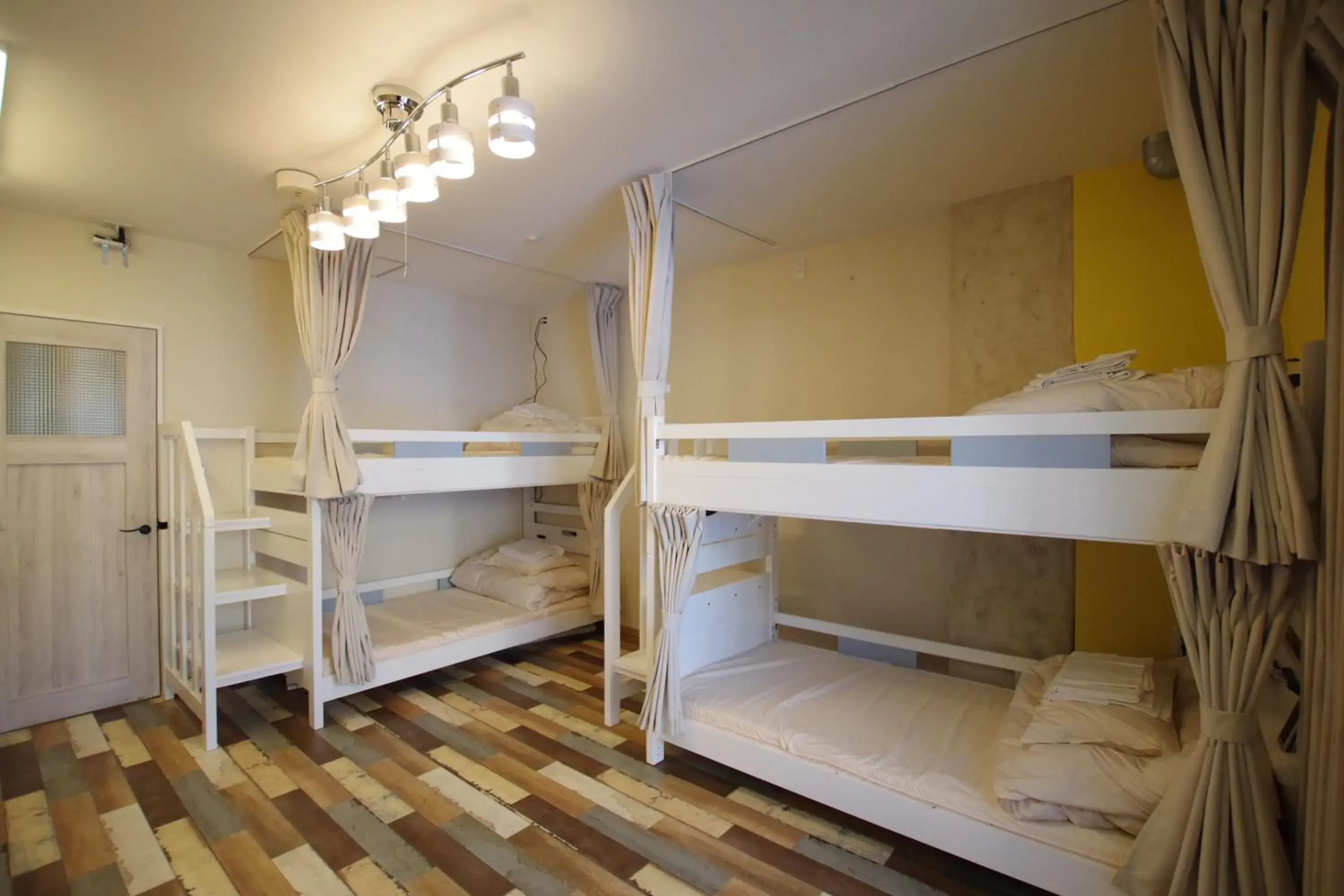 Bed in Cinnamon Guesthouse Dogo Bed in Cinnamon Guesthouse Dogo