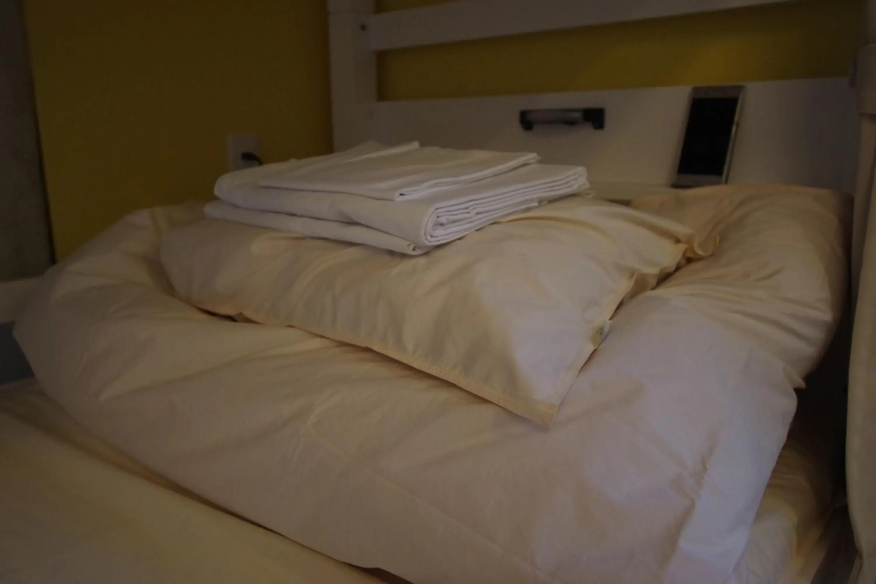 Bed in Cinnamon Guesthouse Dogo Bed in Cinnamon Guesthouse Dogo