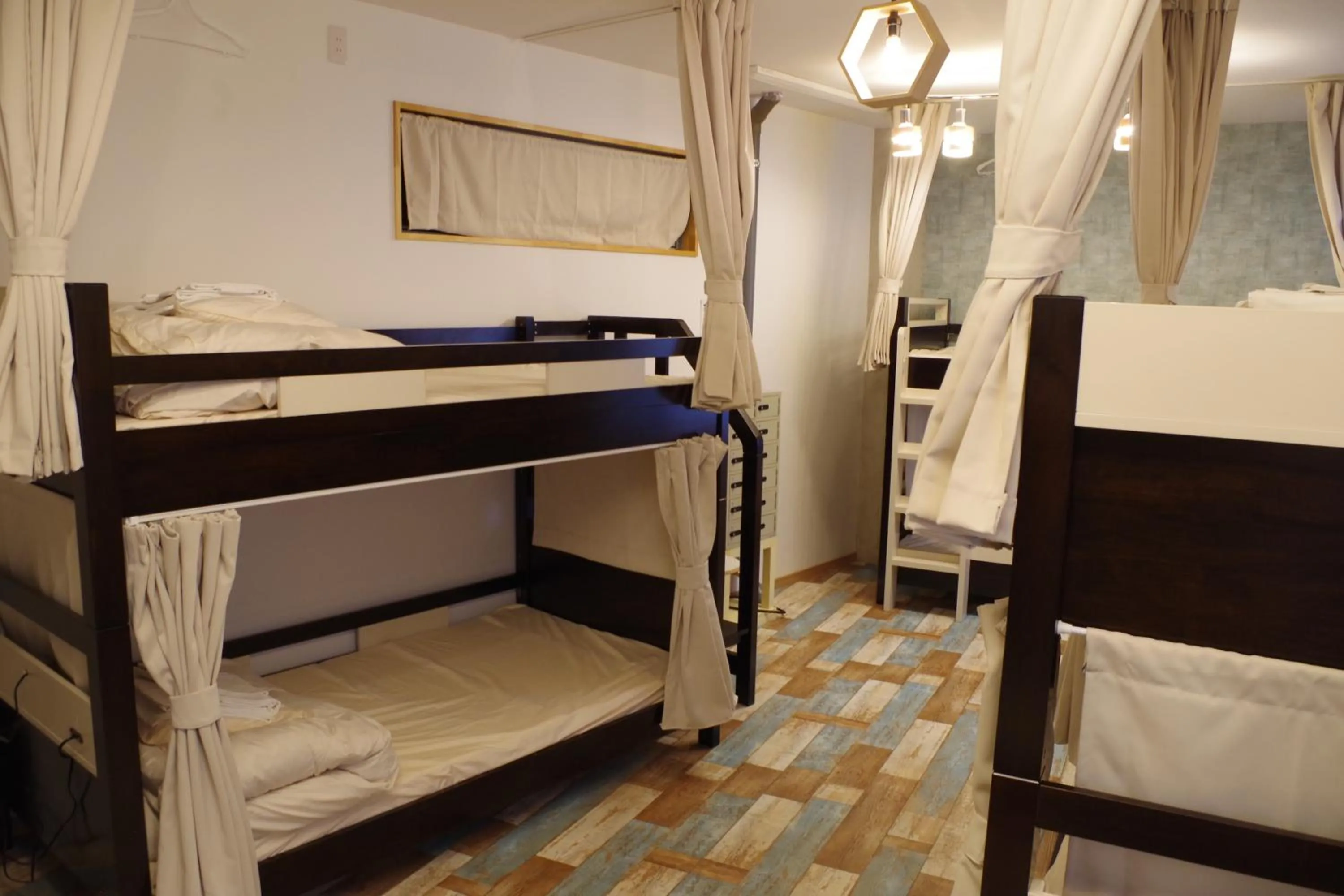 bunk bed, Bed in Cinnamon Guesthouse Dogo