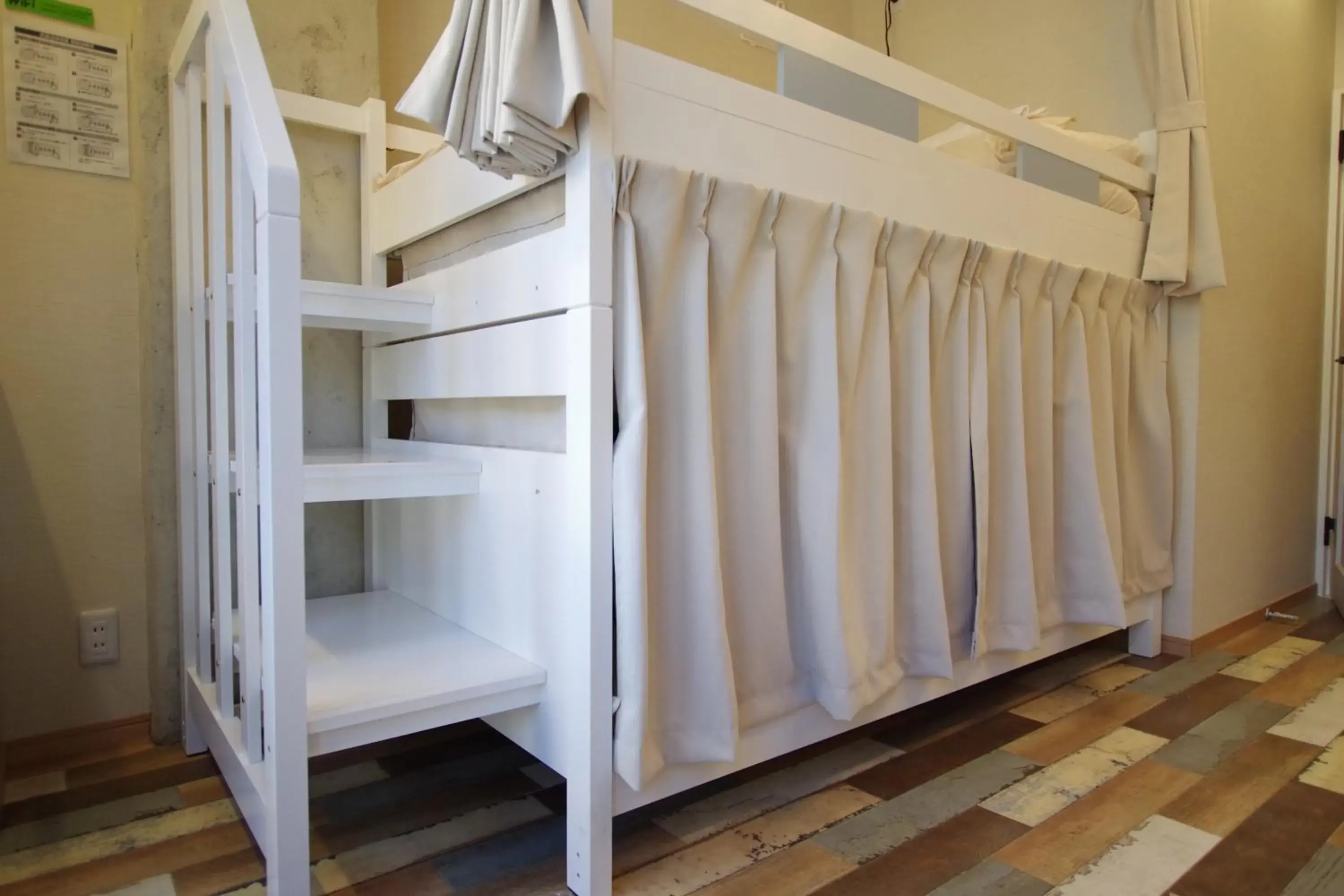 Bed in Cinnamon Guesthouse Dogo Bed in Cinnamon Guesthouse Dogo