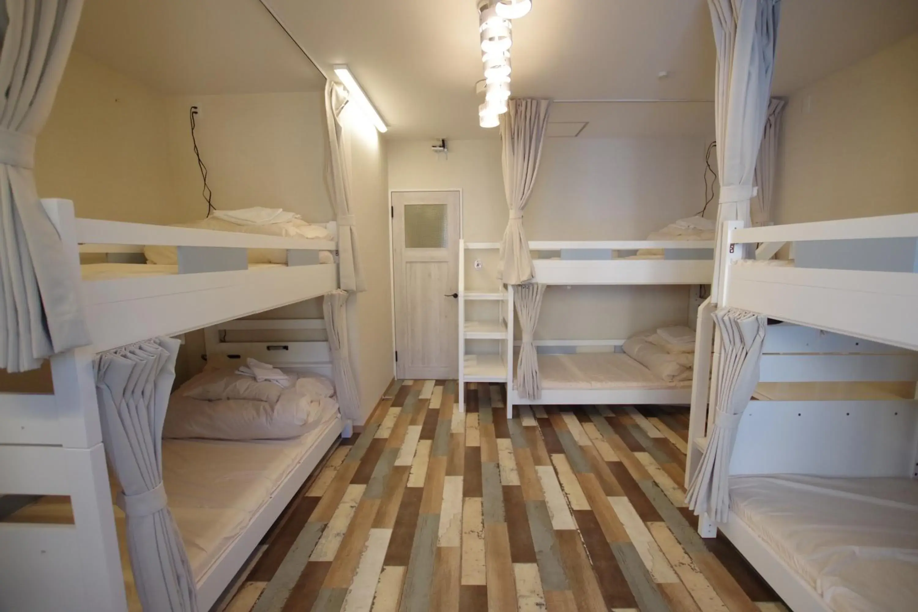 Bed in Cinnamon Guesthouse Dogo Bed in Cinnamon Guesthouse Dogo